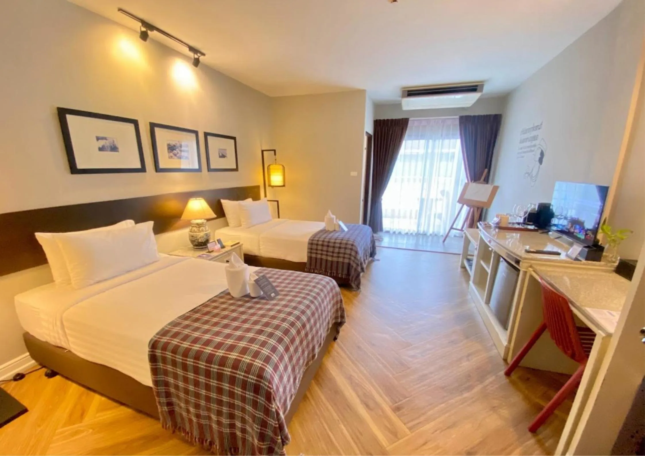 Photo of the whole room, Bed in Yuu Hotel Ubon Ratchathani