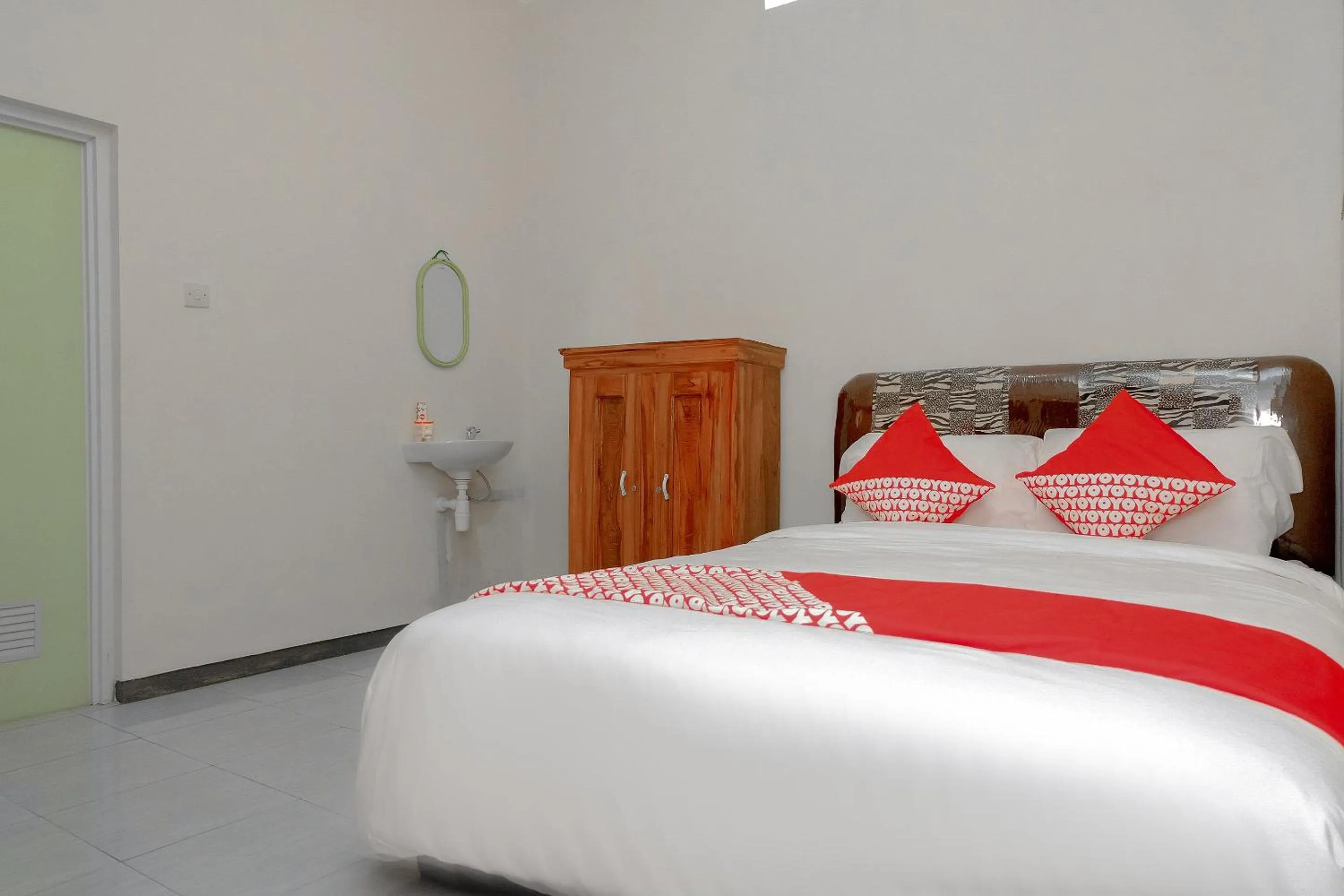 Bedroom in OYO 605 Queen Homestay