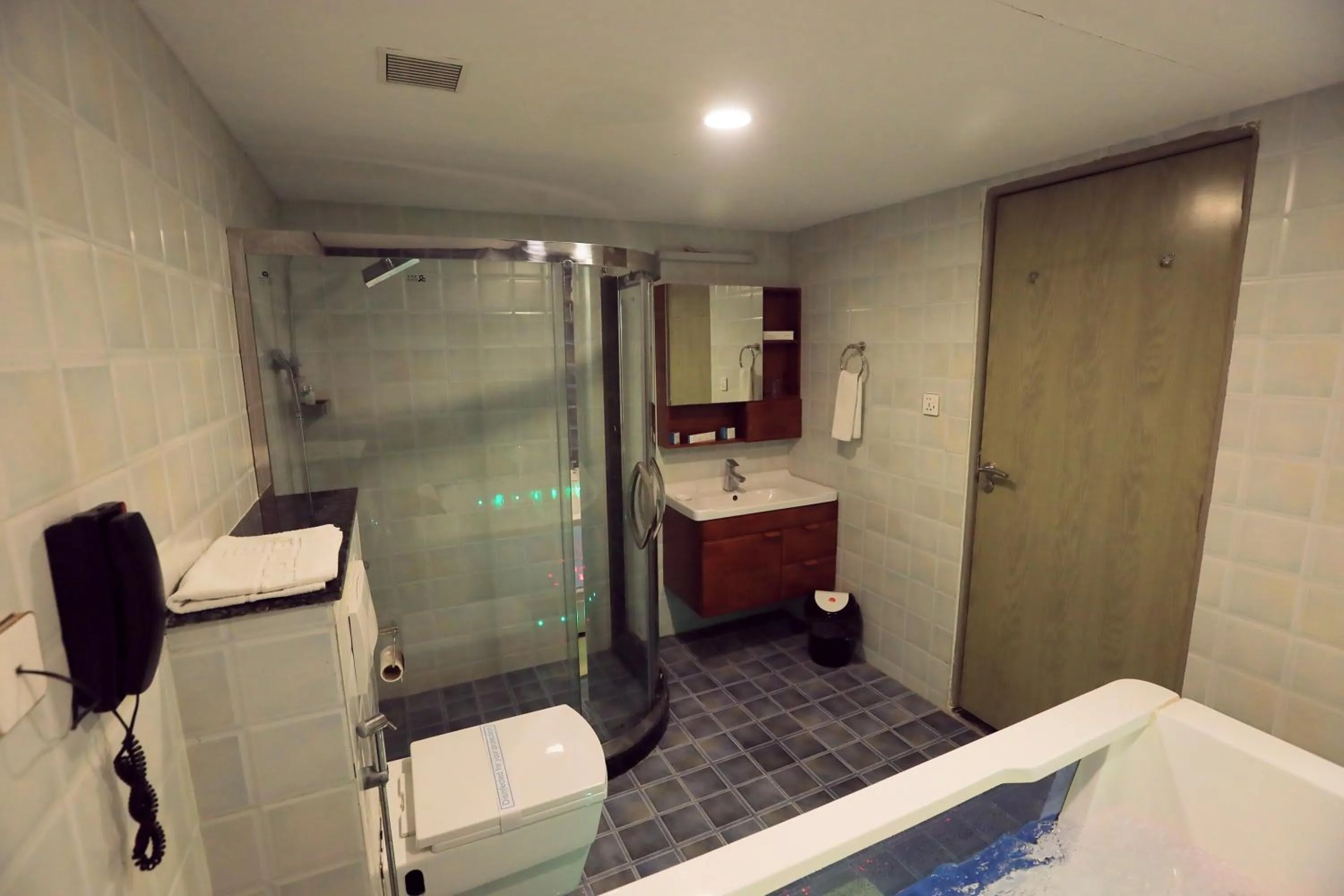 Bathroom in Humming Bird Hotel & Banquet