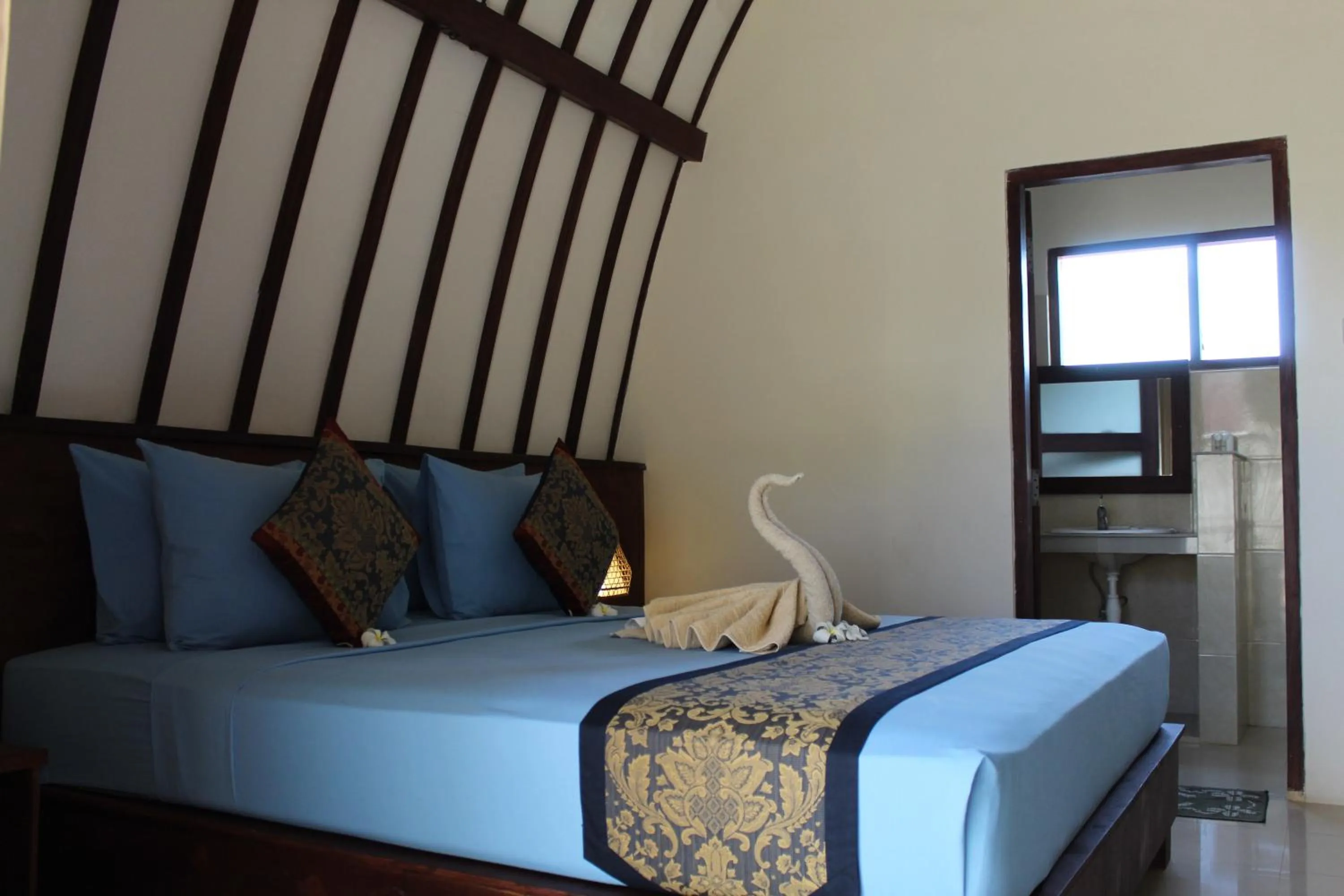 Bed in D'Gilian Bungalow