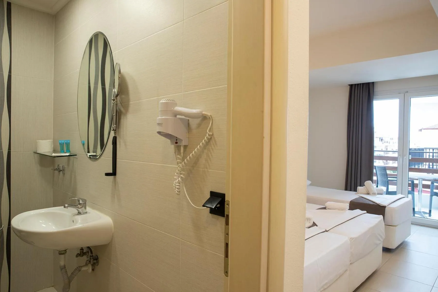 Bed in Dafni Plus Hotel