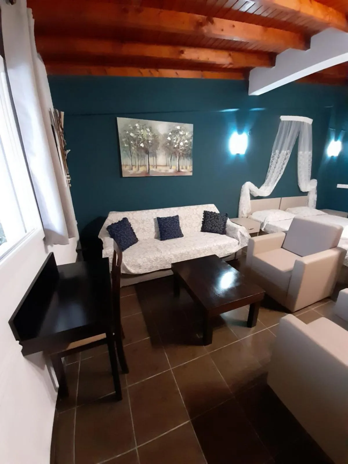 Bed in Victory Apartments Hotel