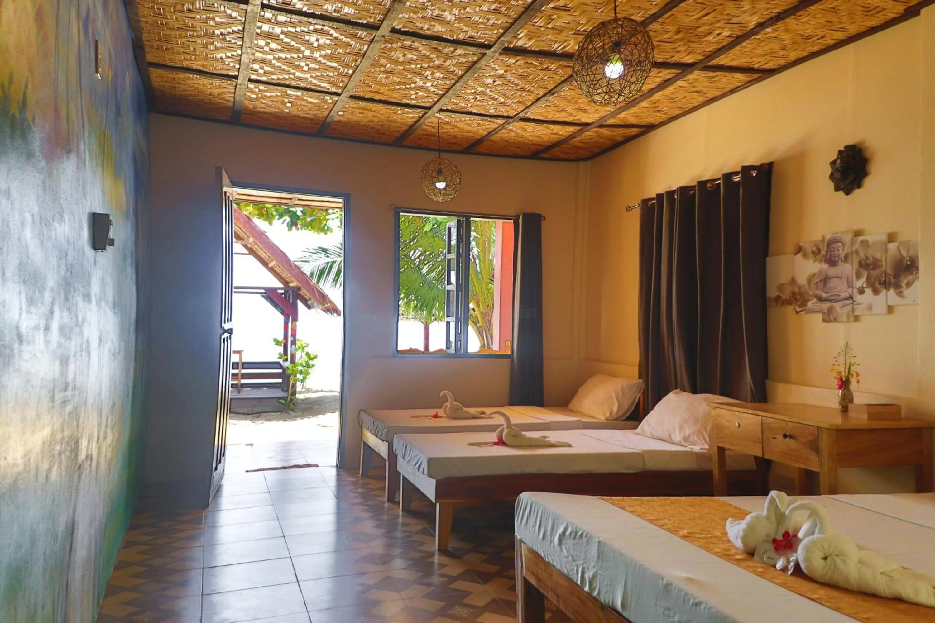 Bed in Mecaja Beach House