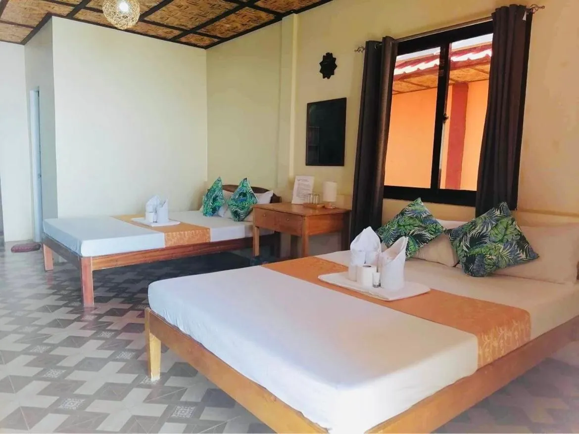 Bed in Mecaja Beach House