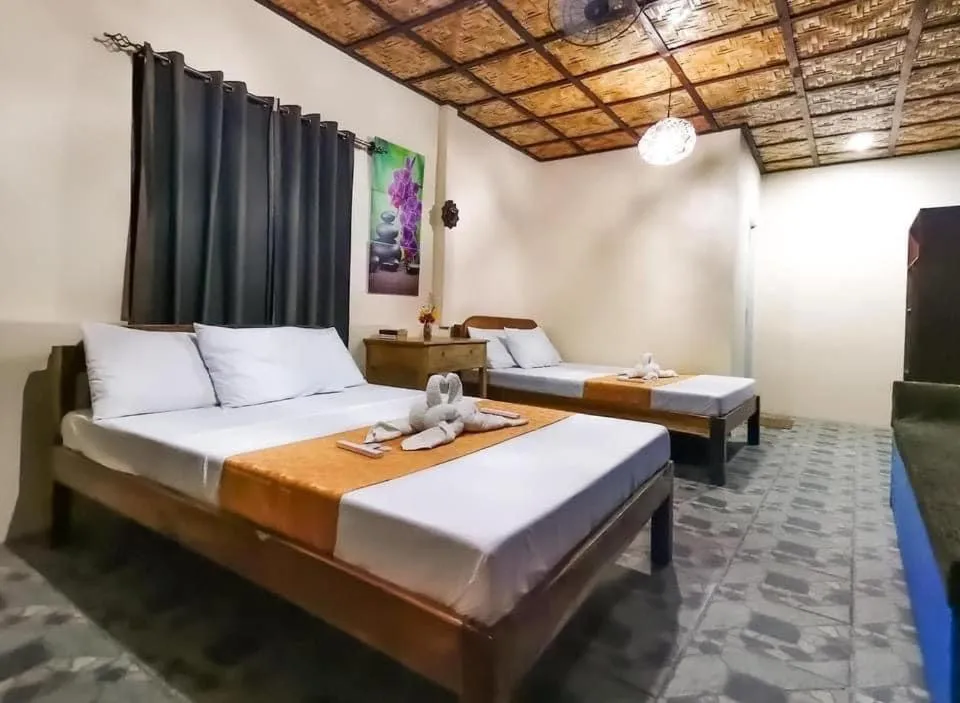 Bed in Mecaja Beach House