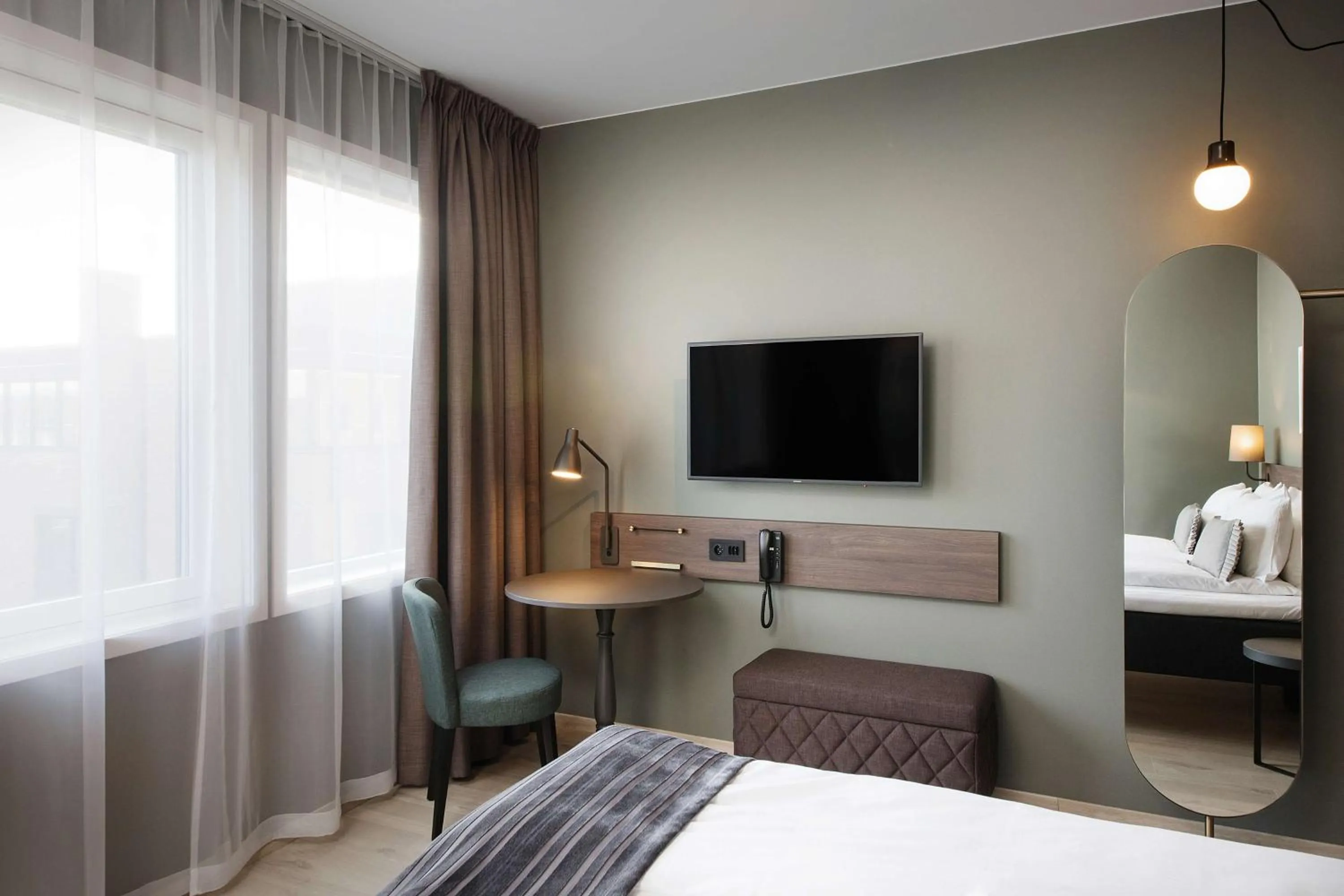 Photo of the whole room, Bed in Scandic Sjølyst