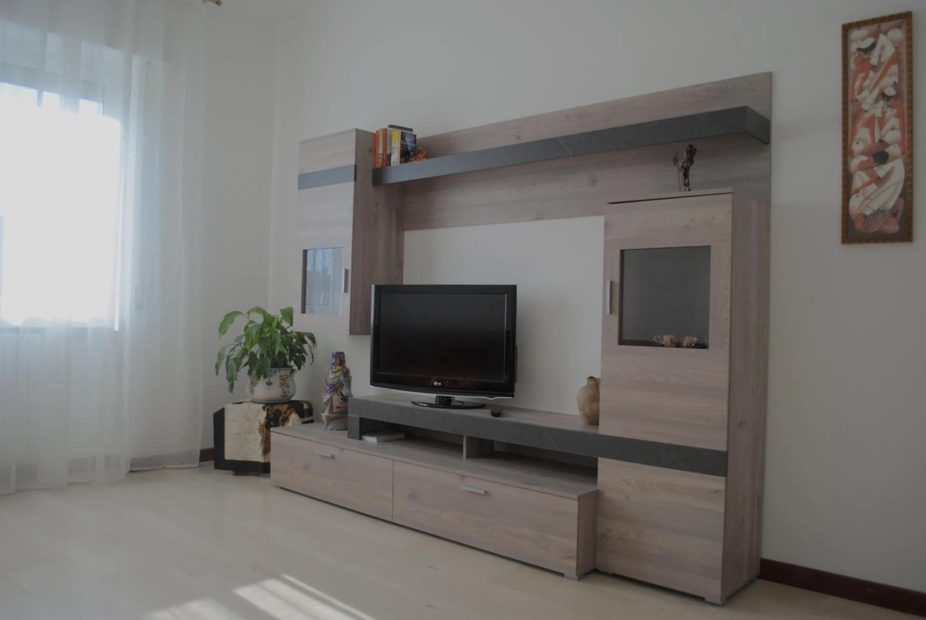 Communal lounge/ TV room in Bnbook-Costantino