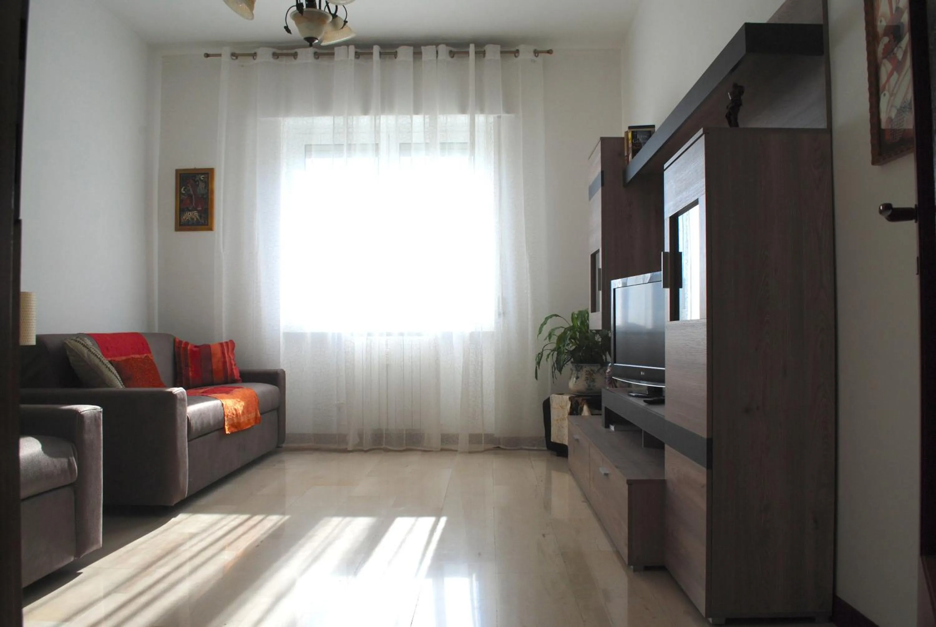 Communal lounge/ TV room in Bnbook-Costantino