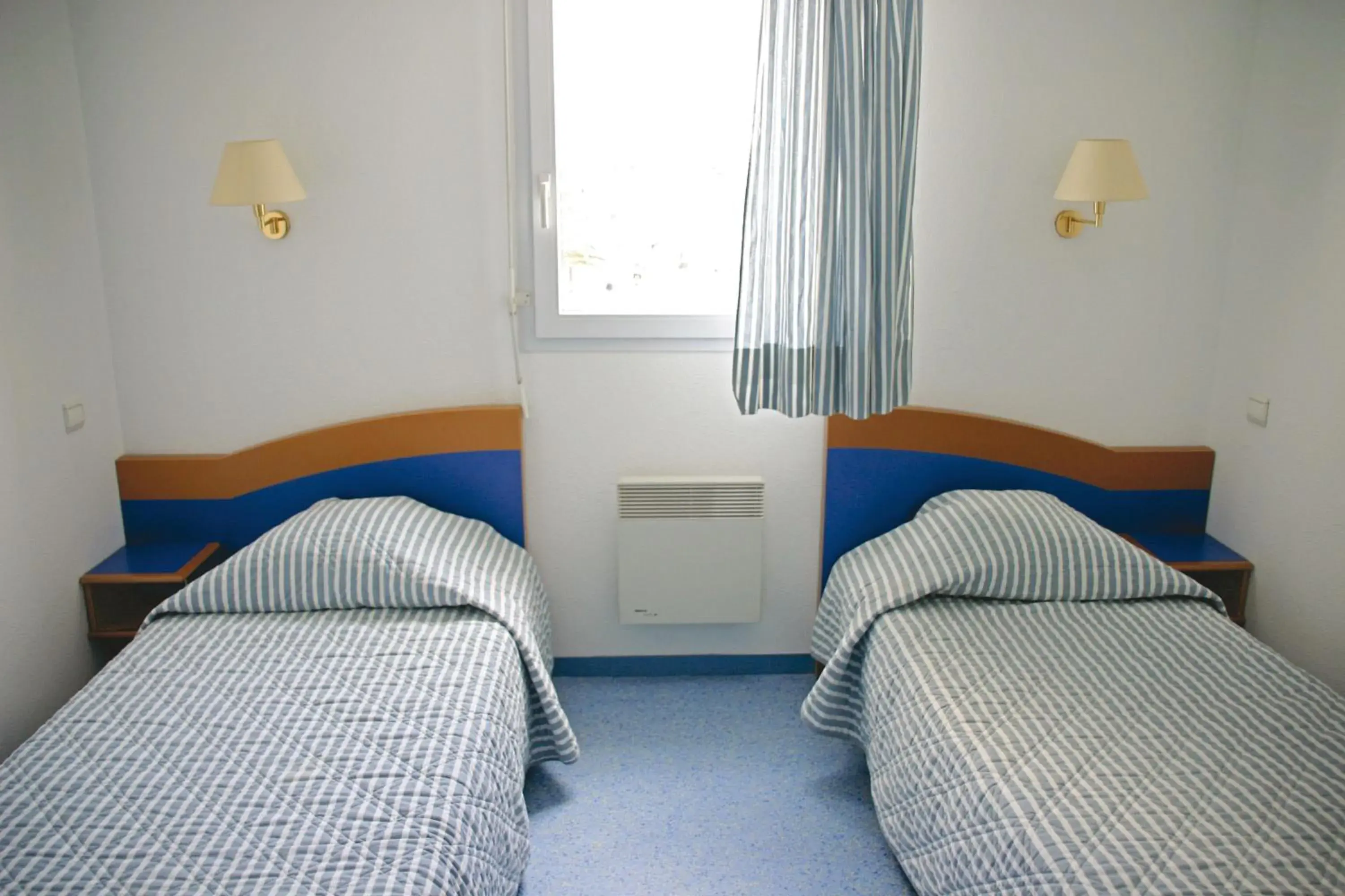 Bedroom, Bed in Hôtel & Résidence Vacances Bleues Orhoïtza Bedroom, Bed in Hôtel & Résidence Vacances Bleues Orhoïtza