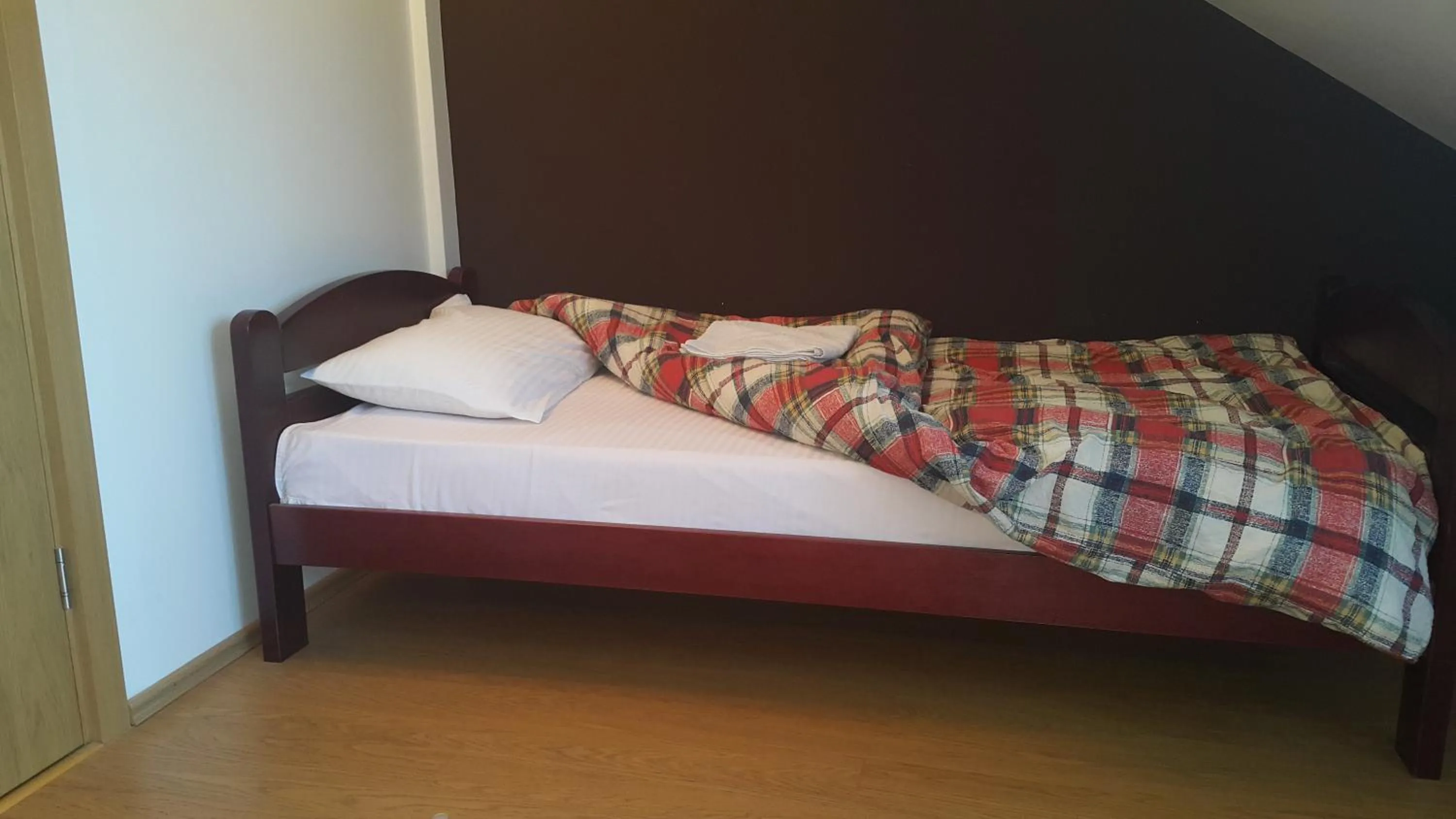 Bed in Guest House Boska