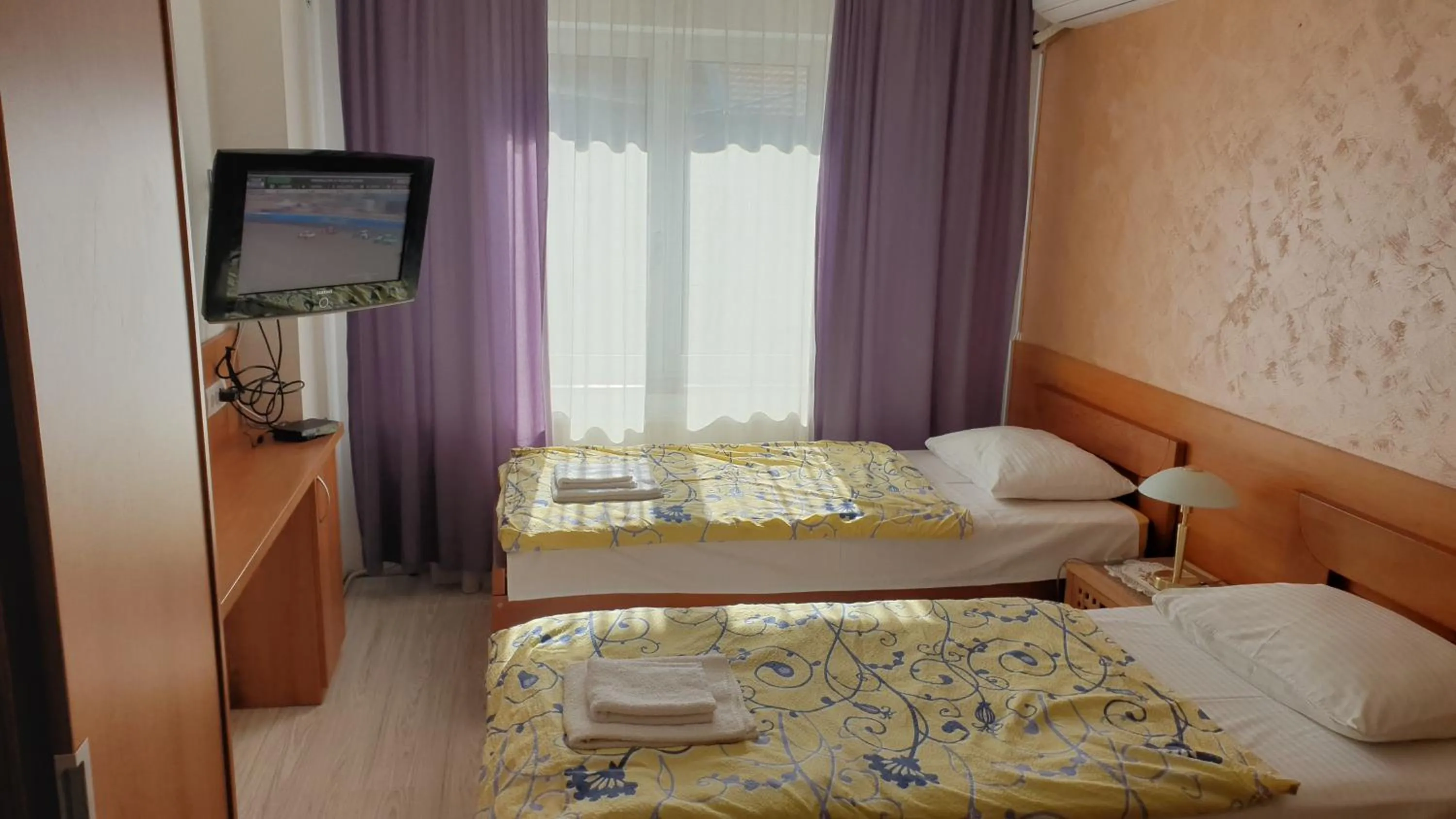 Bed in Guest House Boska