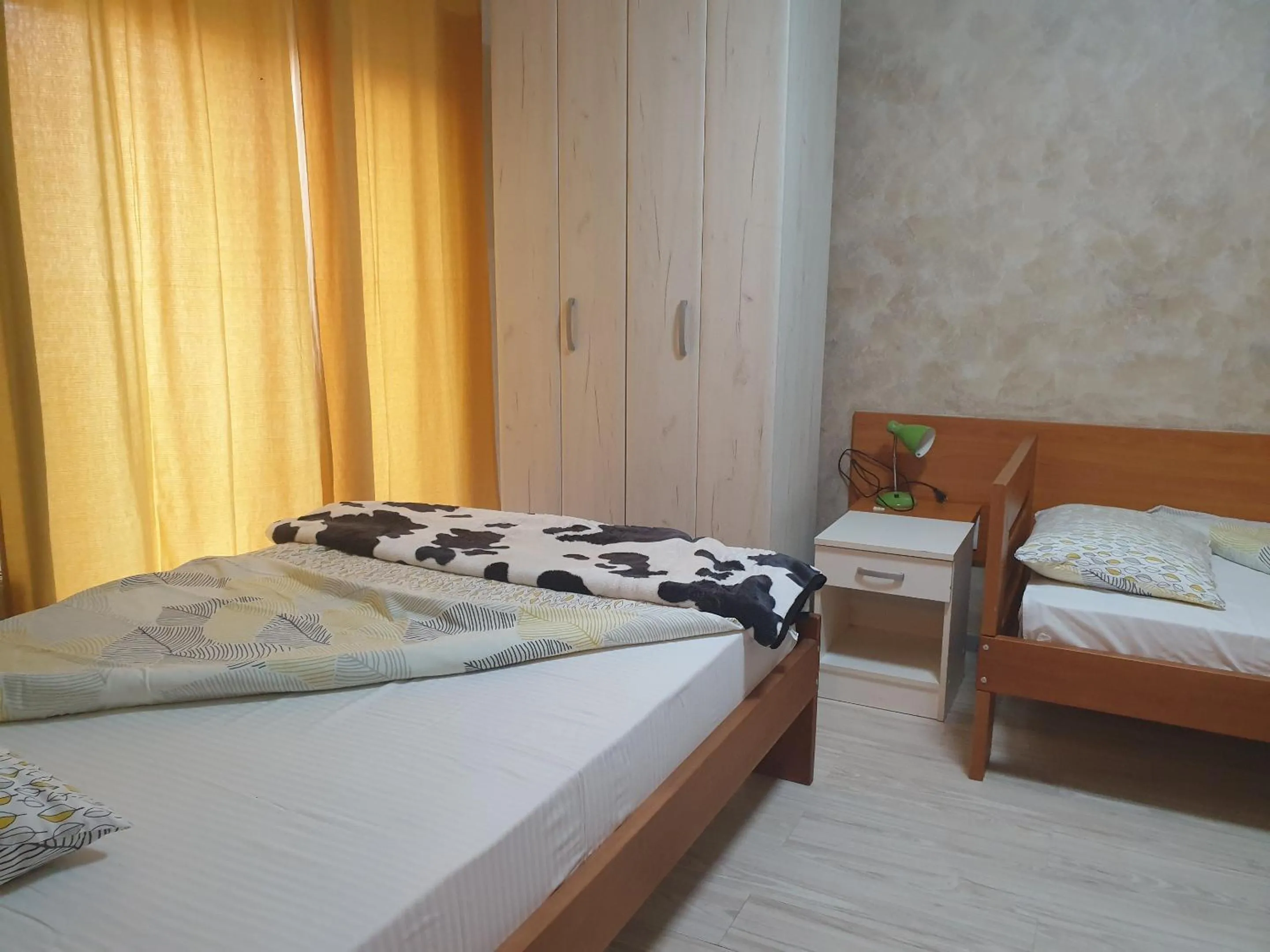 Bed in Guest House Boska