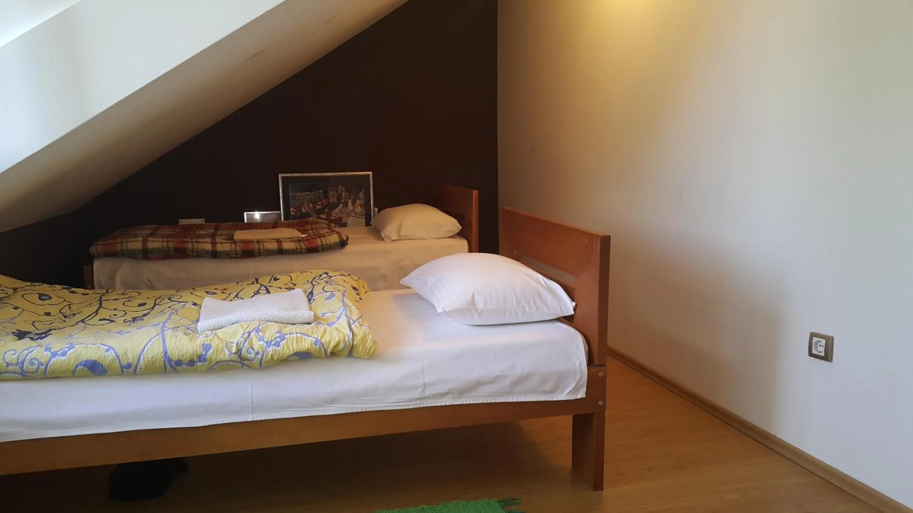 Bed in Guest House Boska