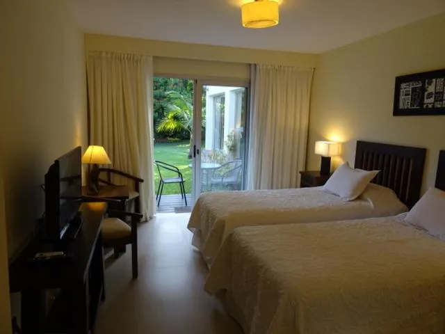 Bed in Petit Chateau Hotel Boutique