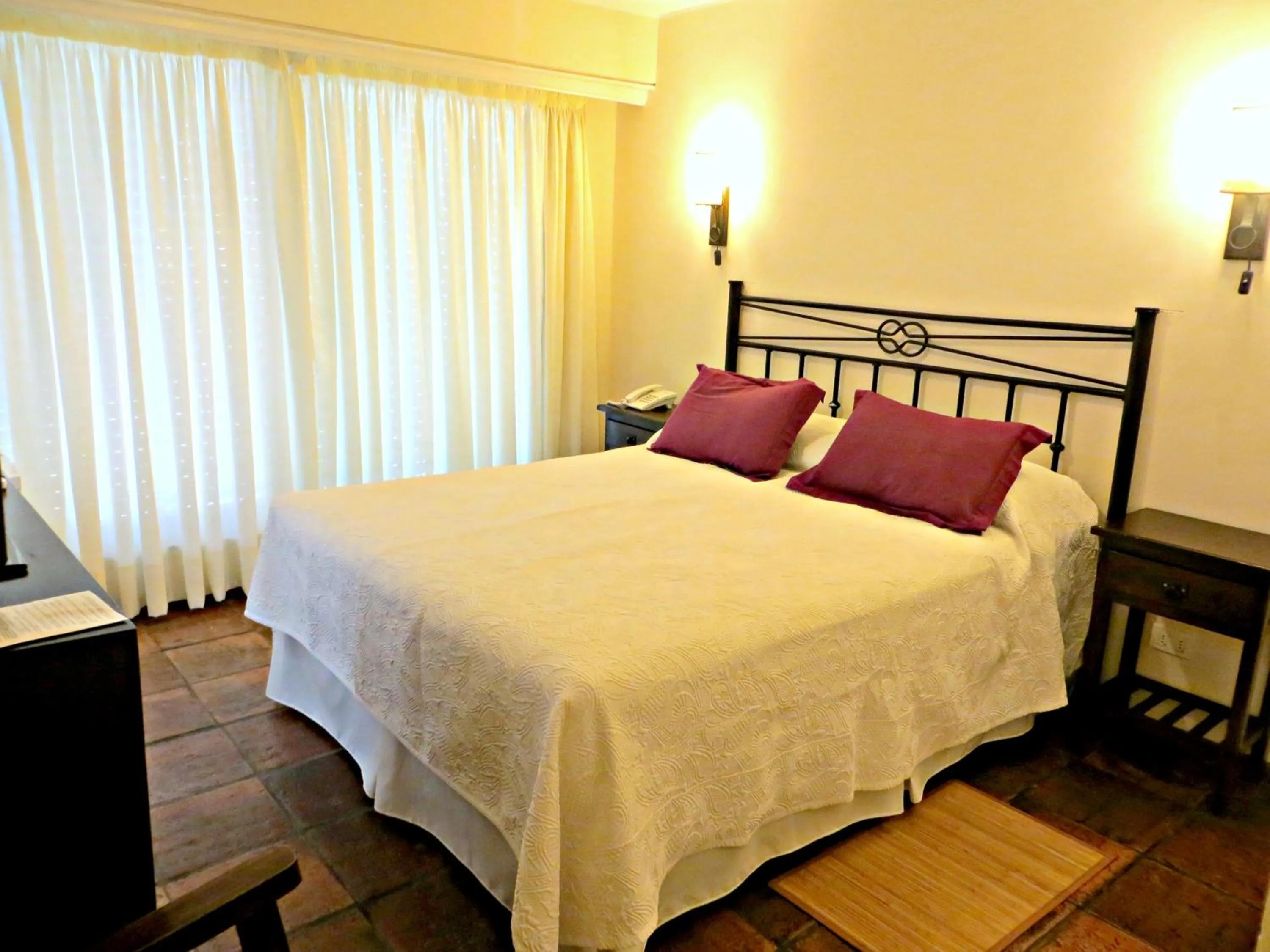 Photo of the whole room, Bed in Petit Chateau Hotel Boutique