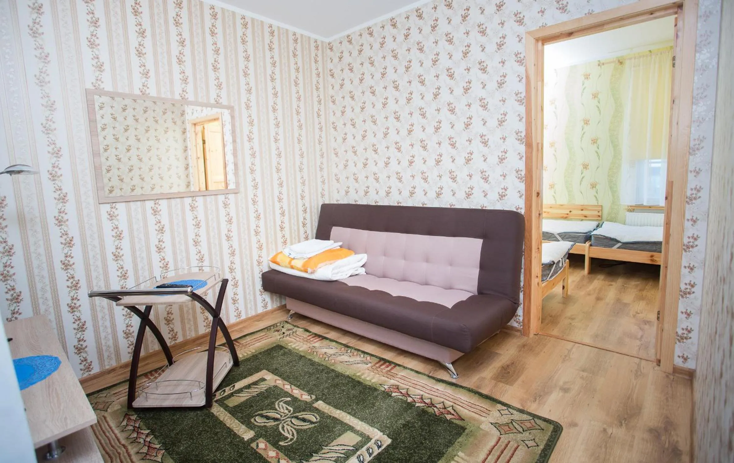 Communal lounge/ TV room, Bed in Katariina Guesthouse