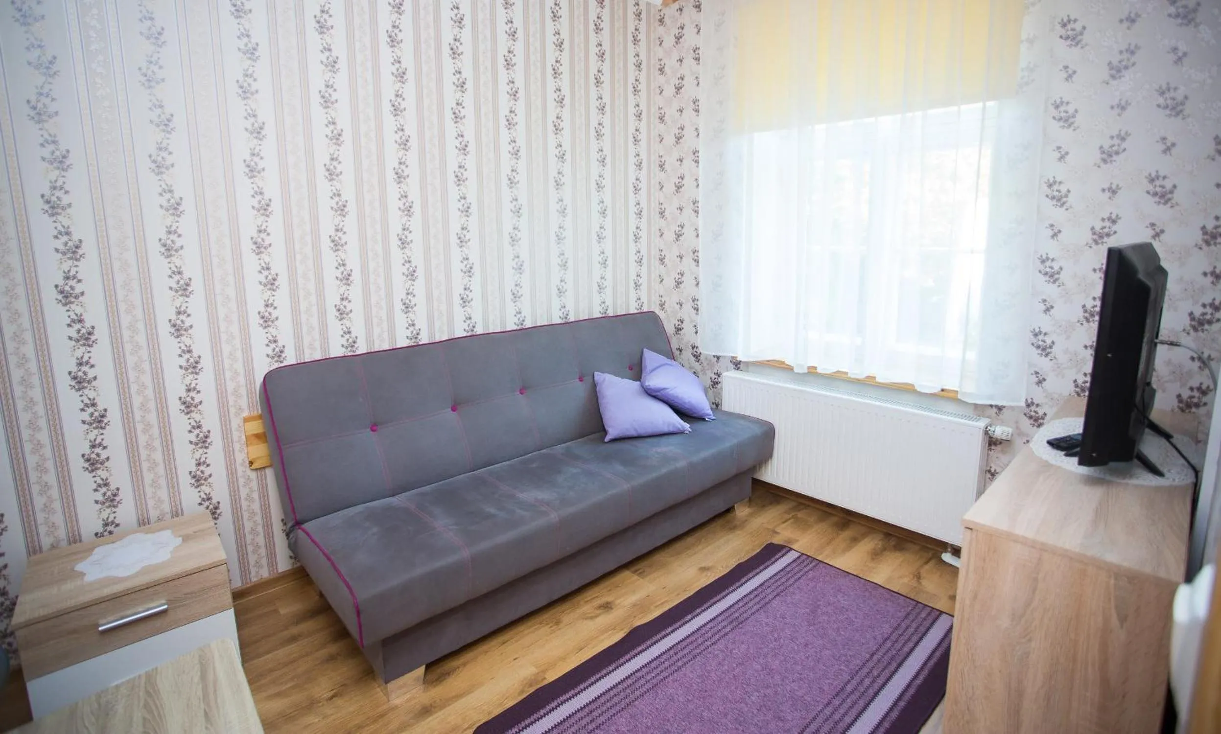 Communal lounge/ TV room in Katariina Guesthouse