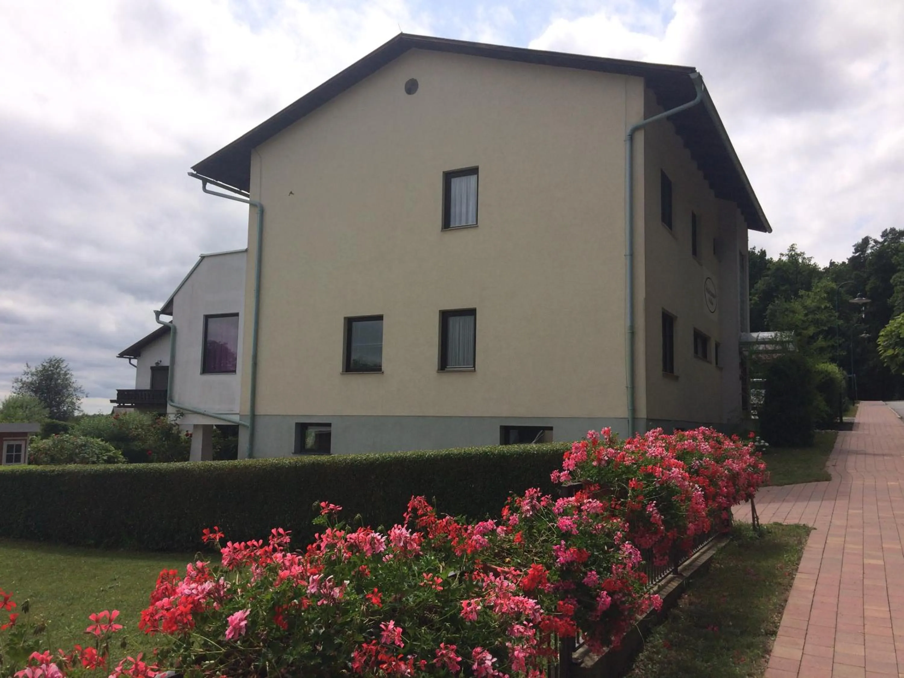 Property building in Haus Camelia