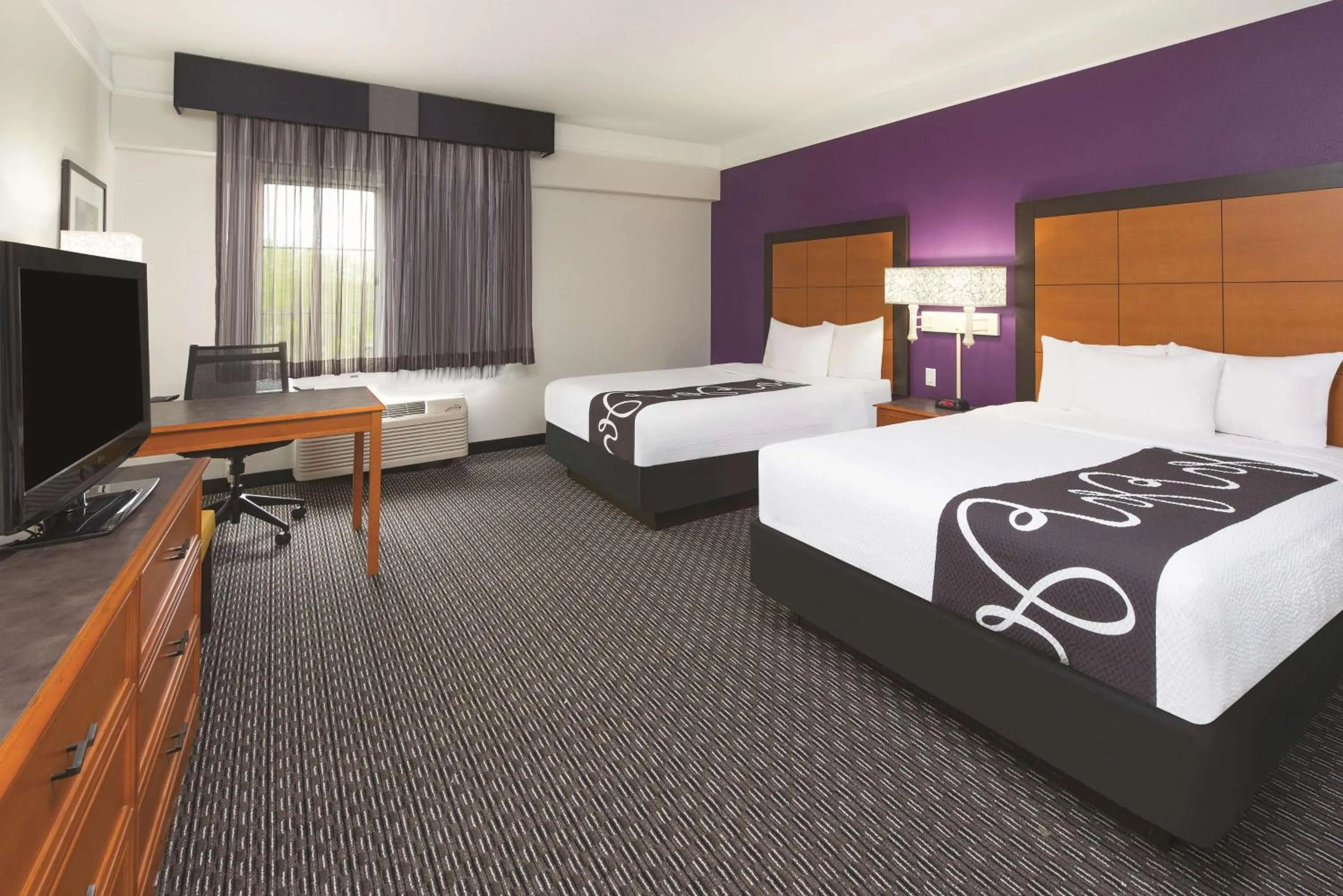 Photo of the whole room, Bed in Travelodge by Wyndham Houston Cy-Fair