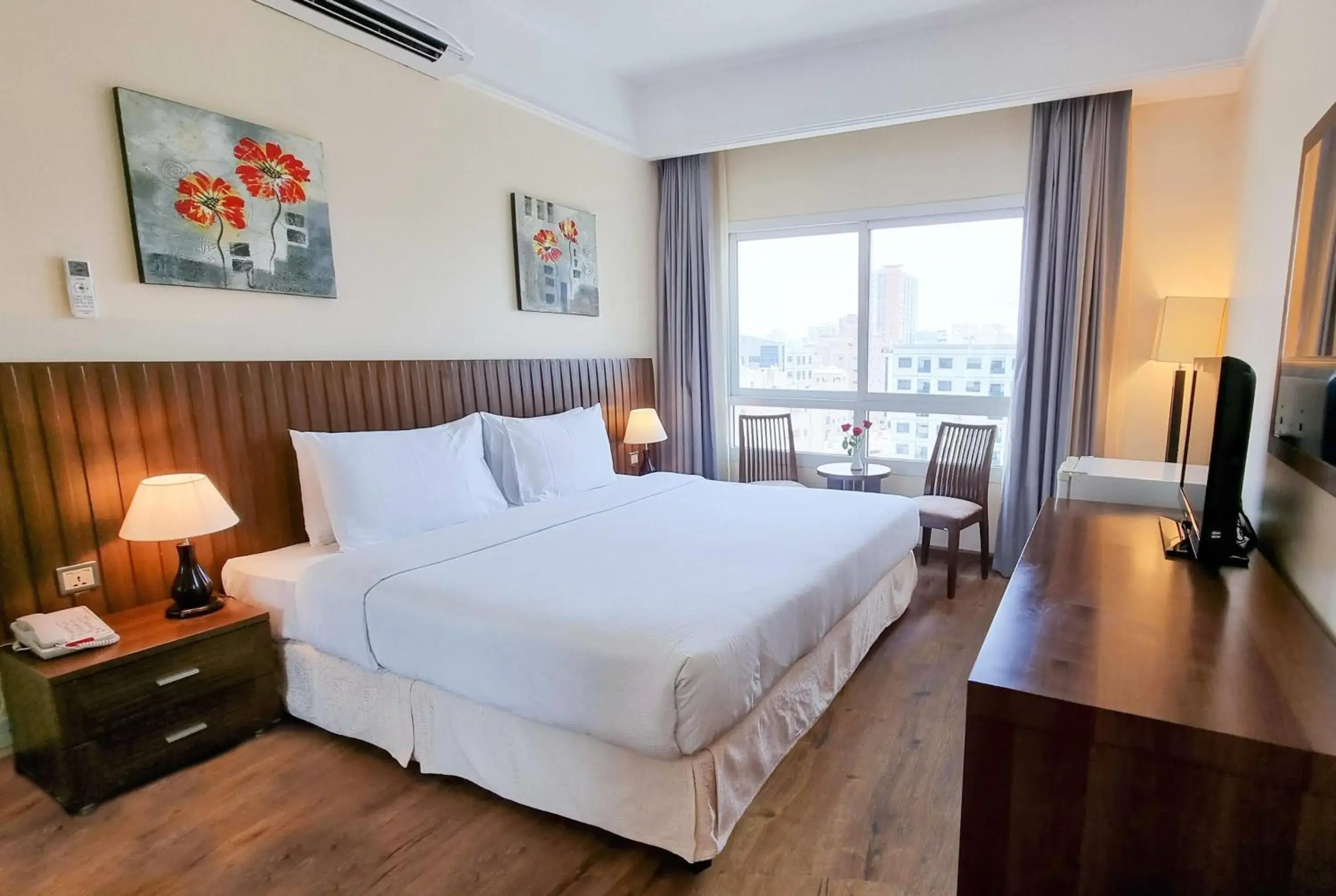 Photo of the whole room, Bed in Ramada by Wyndham Beach Hotel Ajman Photo of the whole room, Bed in Ramada by Wyndham Beach Hotel Ajman