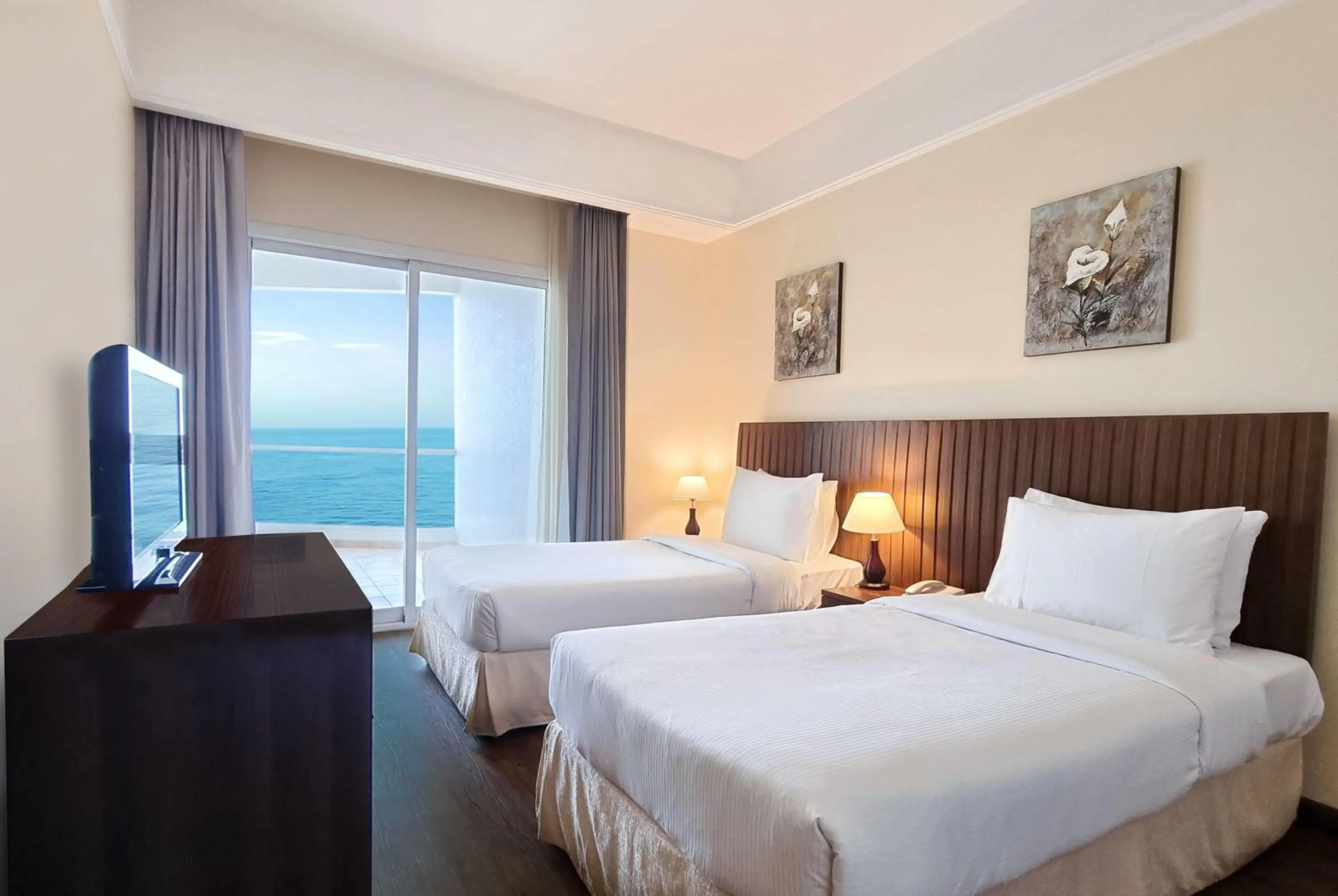 Photo of the whole room, Bed in Ramada by Wyndham Beach Hotel Ajman