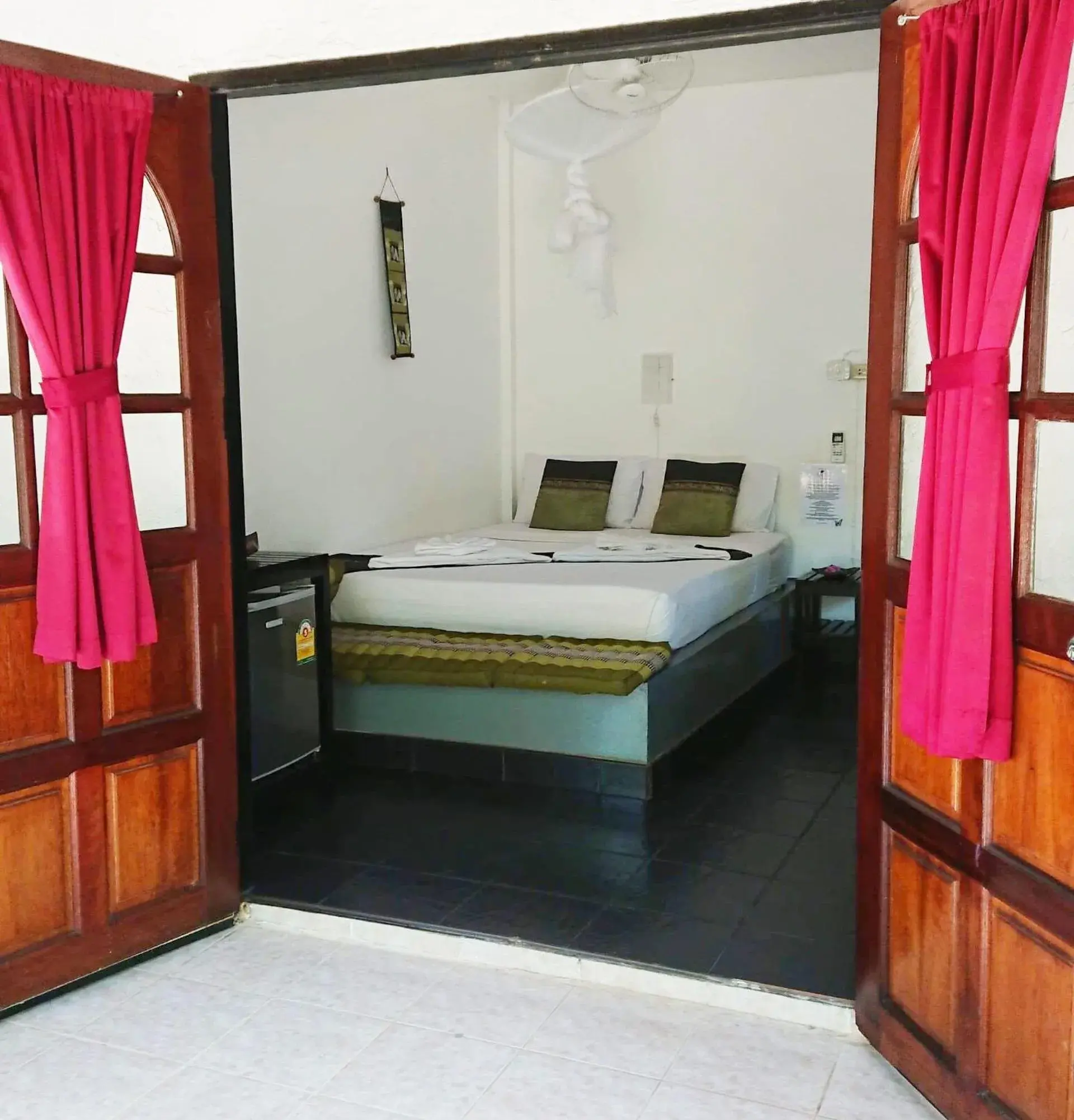 Bed in Papillon Bungalows