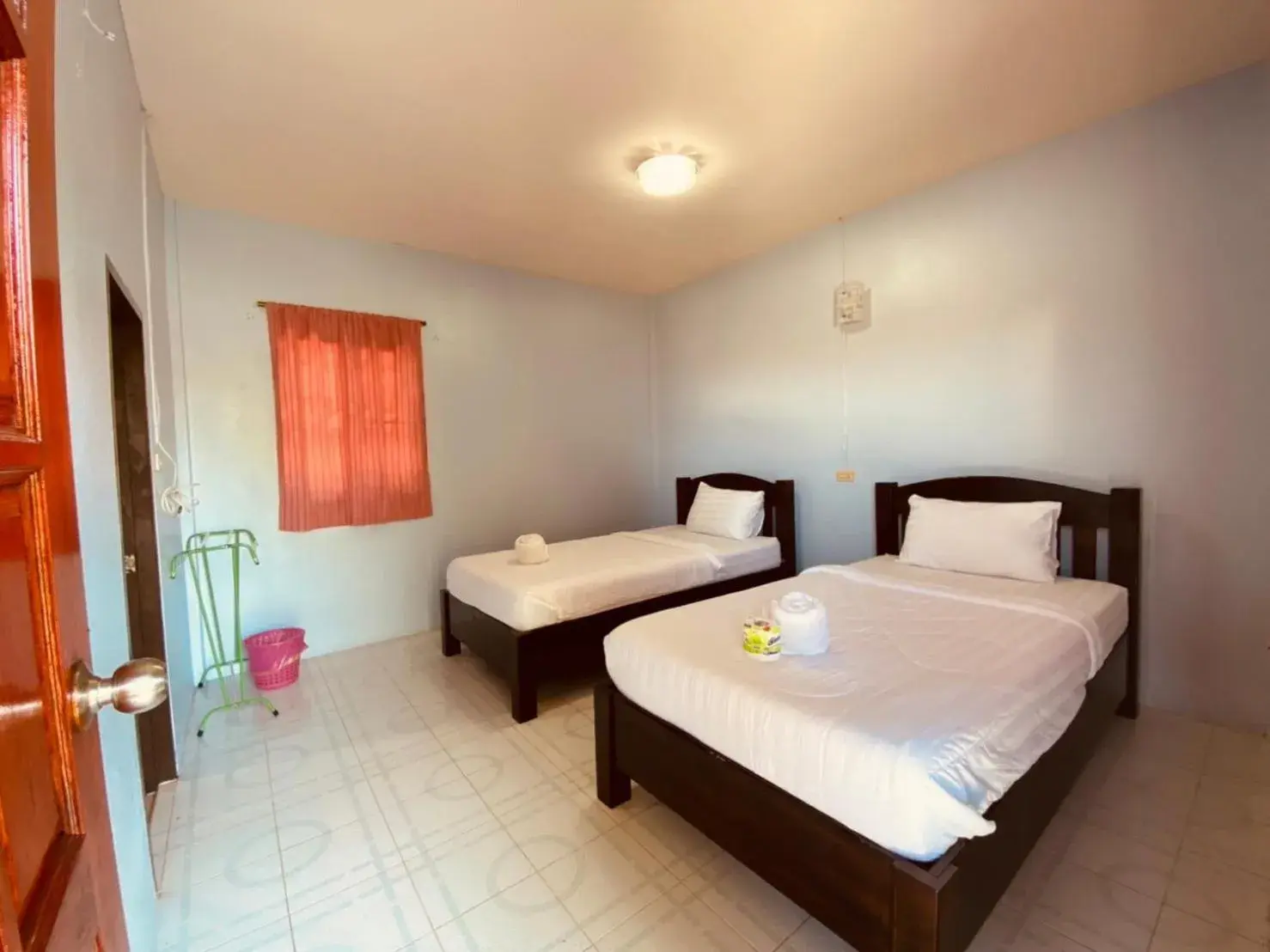 Bed in Phupha Bungalow Haad Rin Bed in Phupha Bungalow Haad Rin