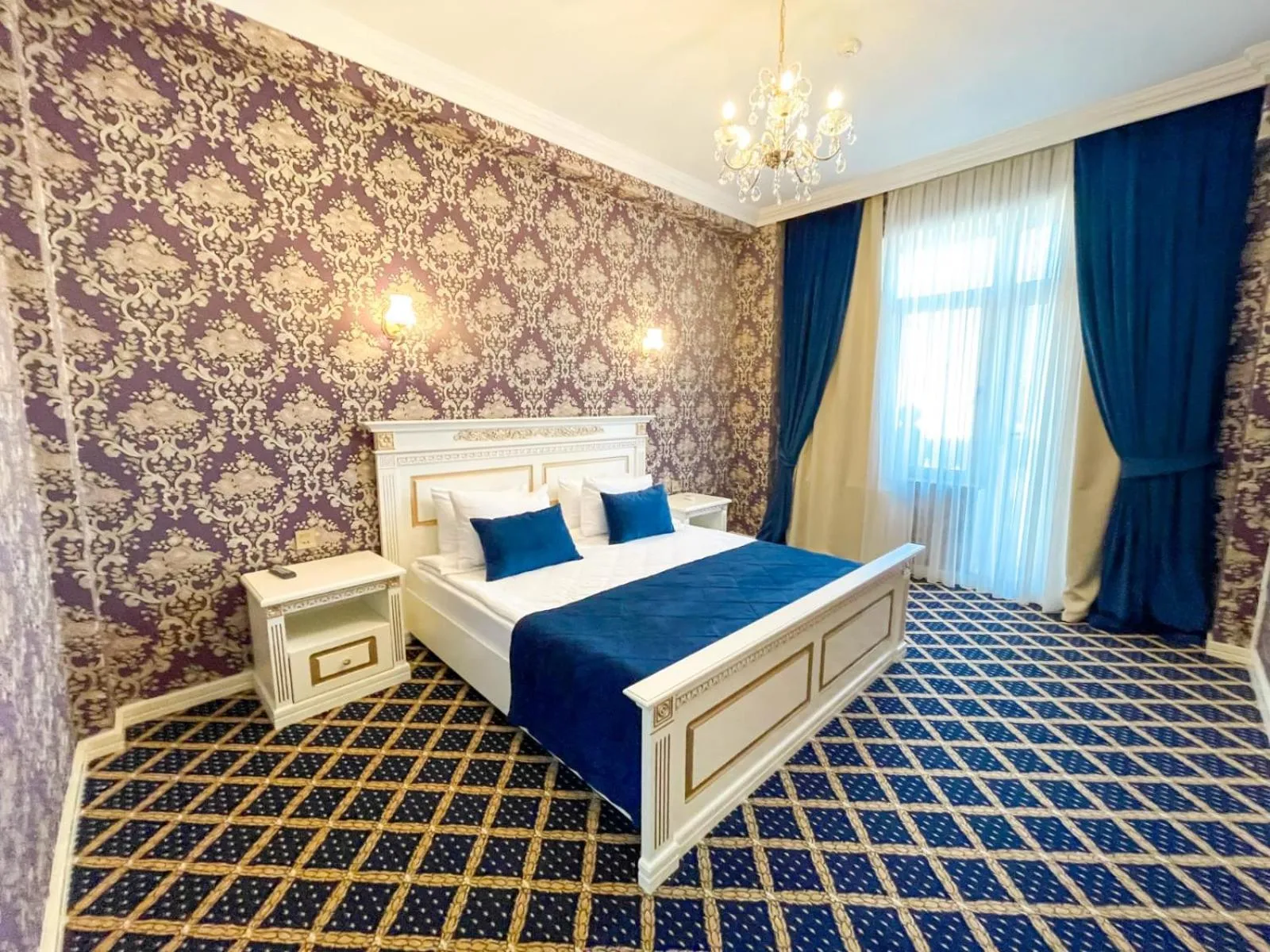 Bed in Premier Palace Baku