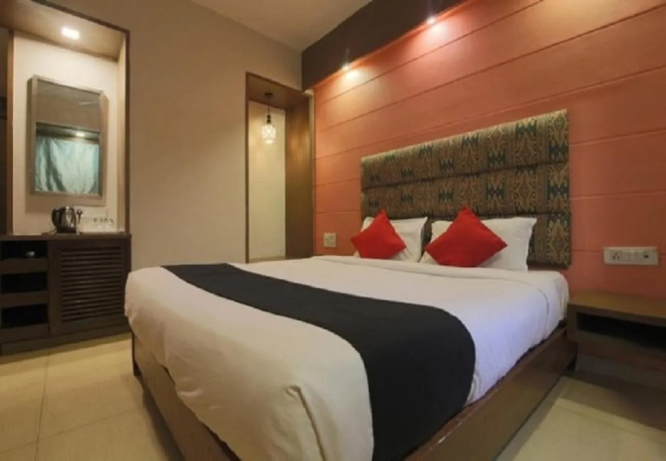 Bed in Tangerine Boutique Resort