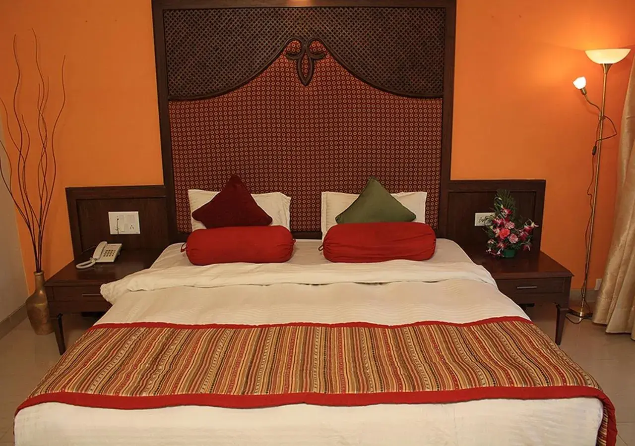 Bed in Tangerine Boutique Resort Bed in Tangerine Boutique Resort