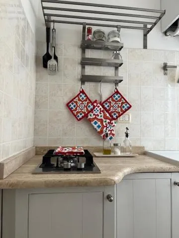 Kitchen or kitchenette in B&B Le Comari Salentine