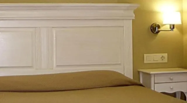 Bed in Hotel Bruselas