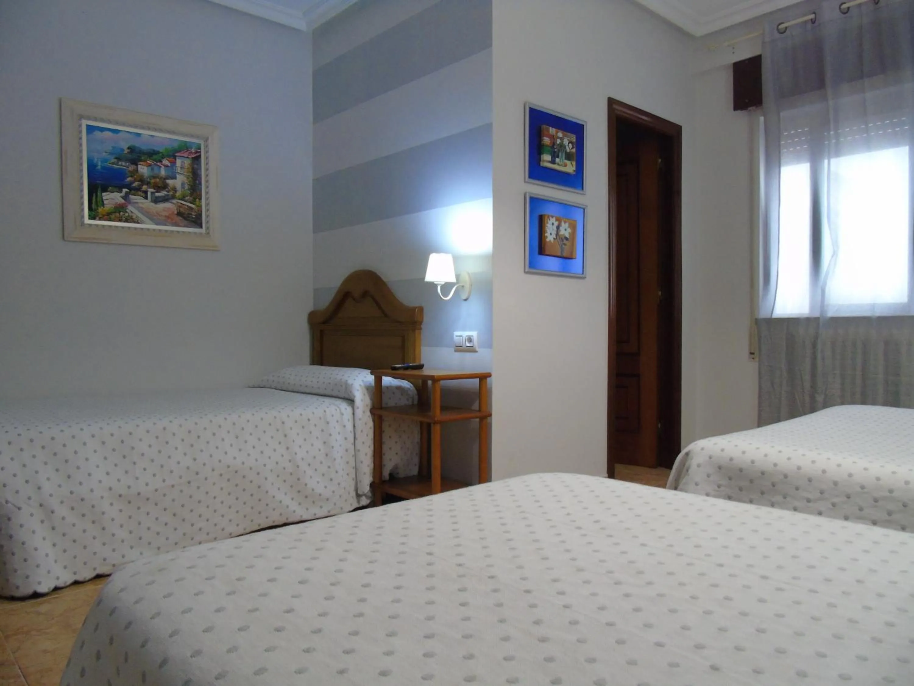 Bed in Hotel Bruselas