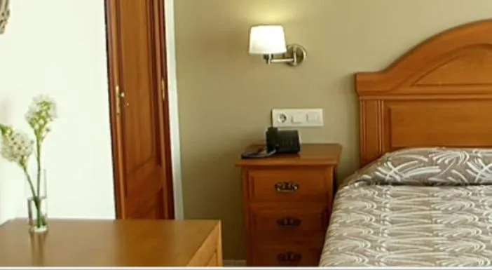 Bed in Hotel Bruselas