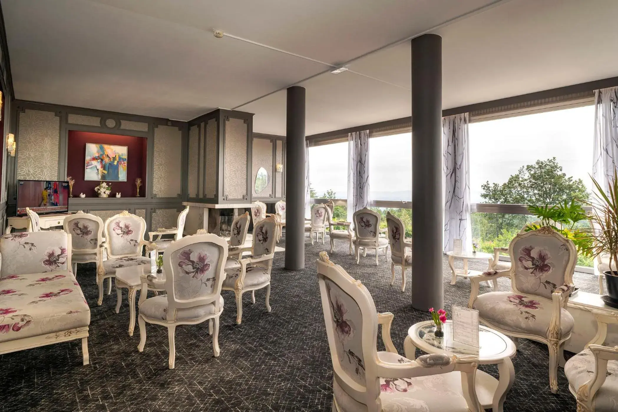 Living room in Alexain Hotel Restaurant & Wellness - Colmar Ouest Living room in Alexain Hotel Restaurant & Wellness - Colmar Ouest