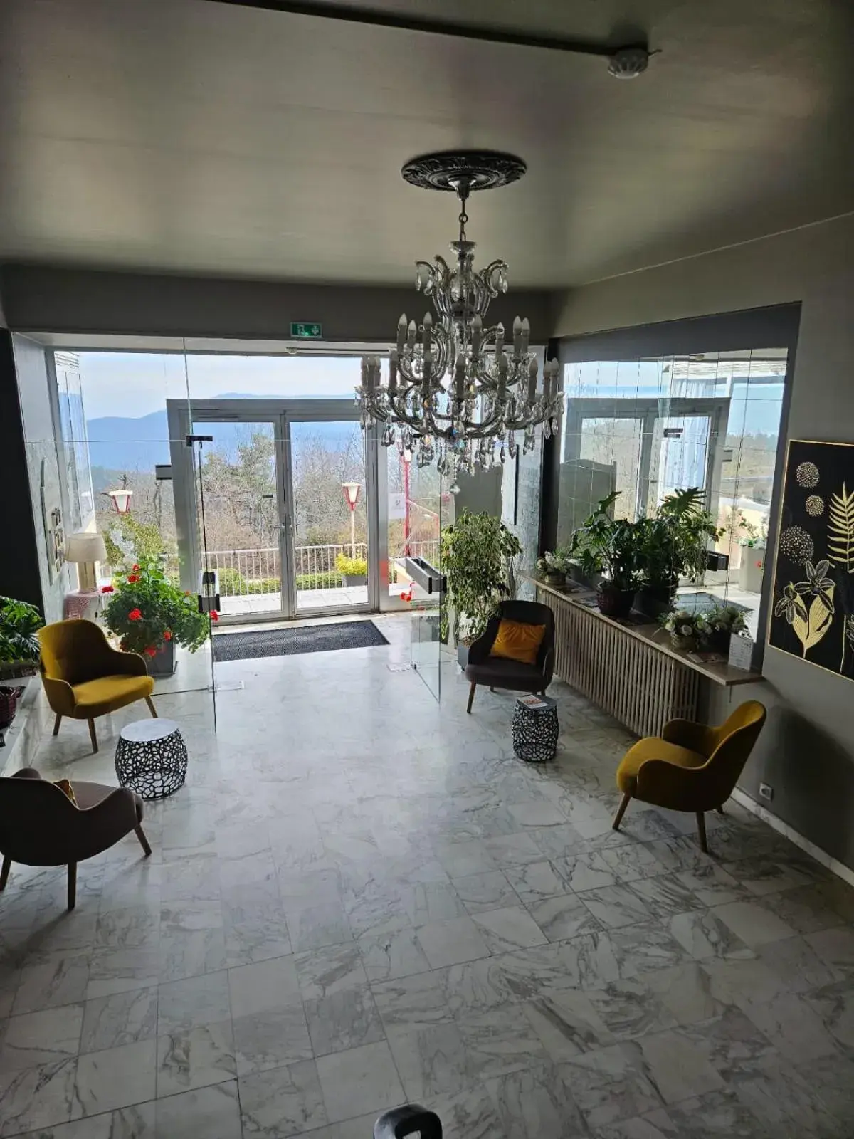 Lobby or reception in Alexain Hotel Restaurant & Wellness - Colmar Ouest Lobby or reception in Alexain Hotel Restaurant & Wellness - Colmar Ouest