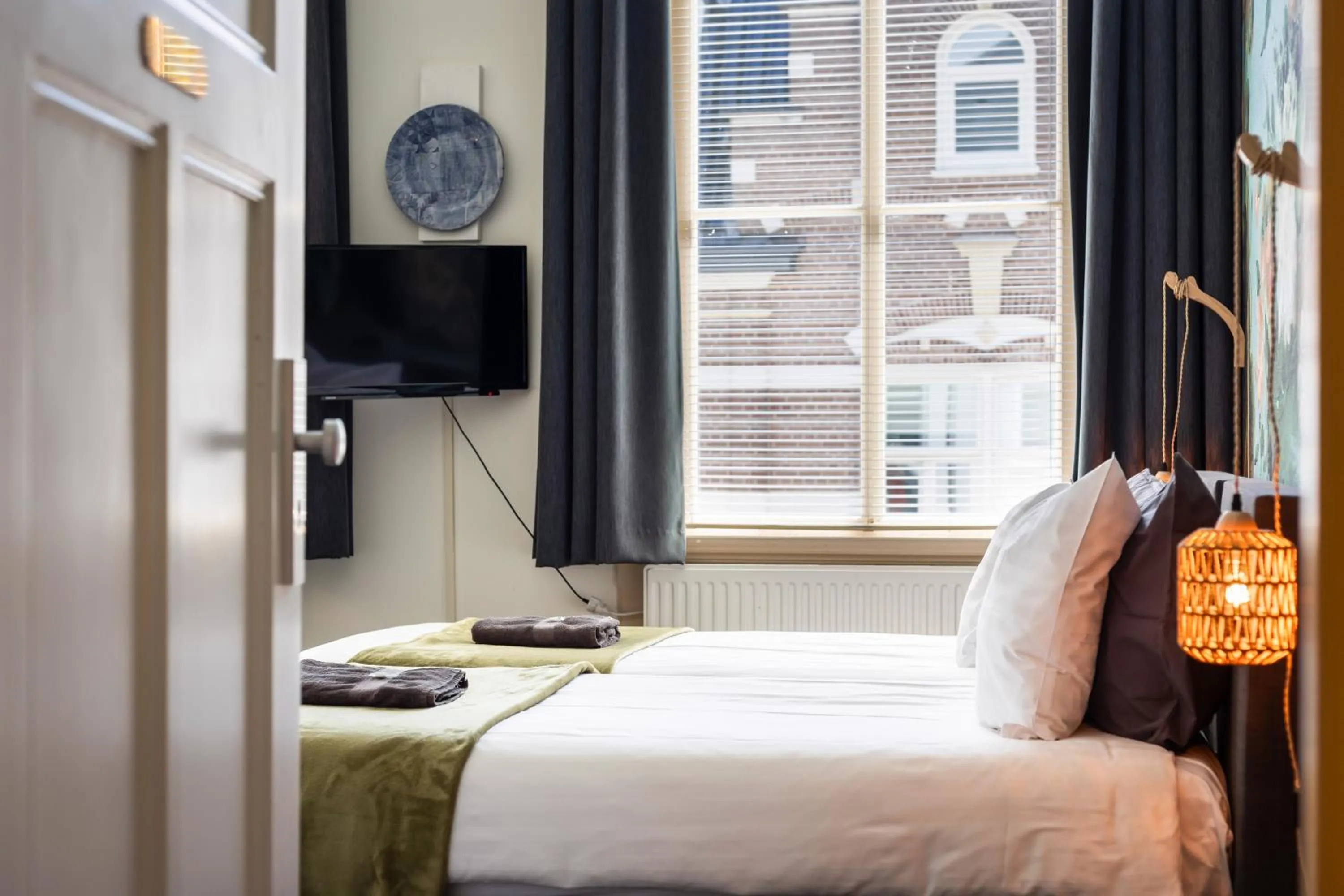 Standard Twin Room with Shared Bathroom - single occupancy in Het Oude Kantongerecht