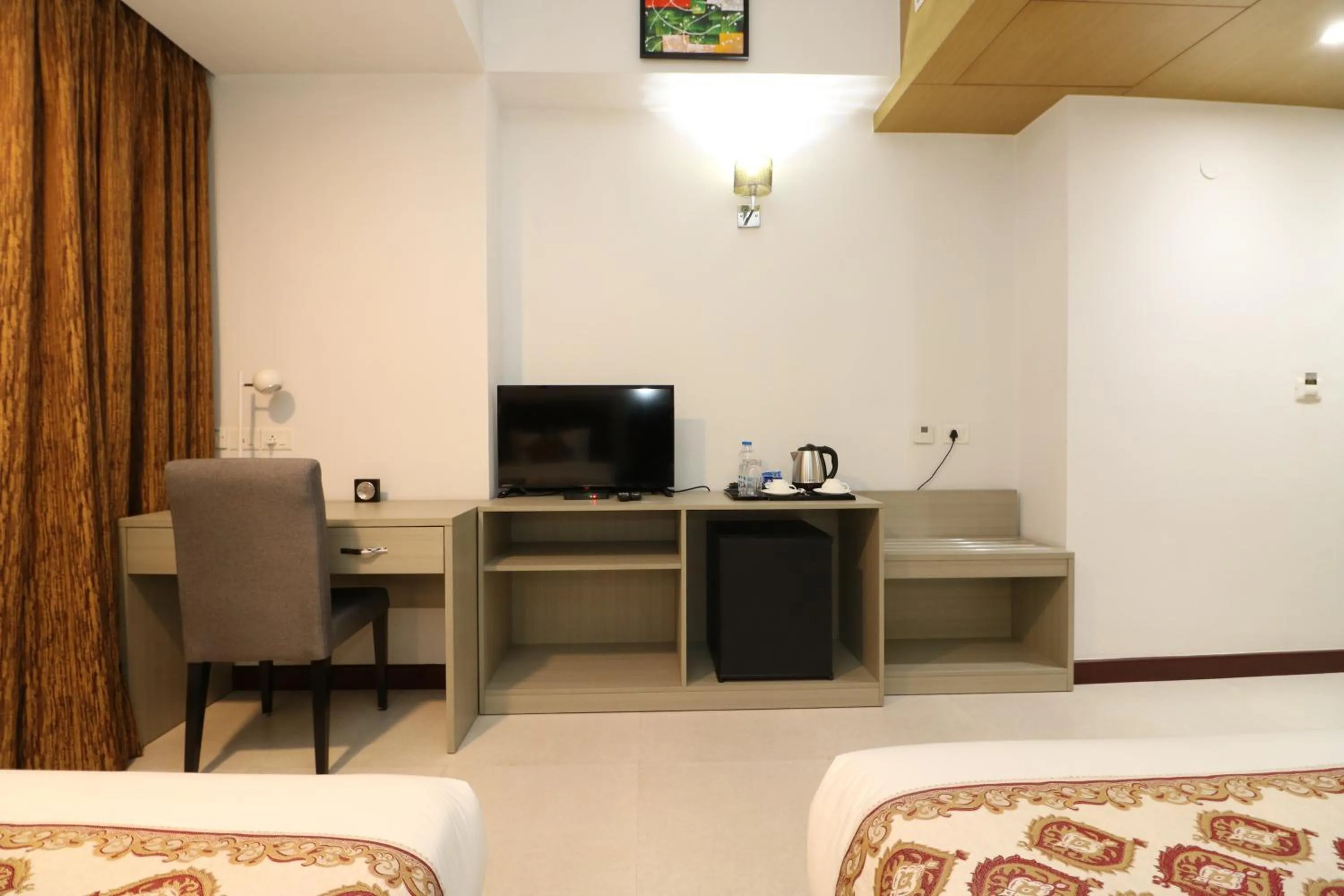 TV and multimedia in Aristocrat Hotel, New Town, Kolkata