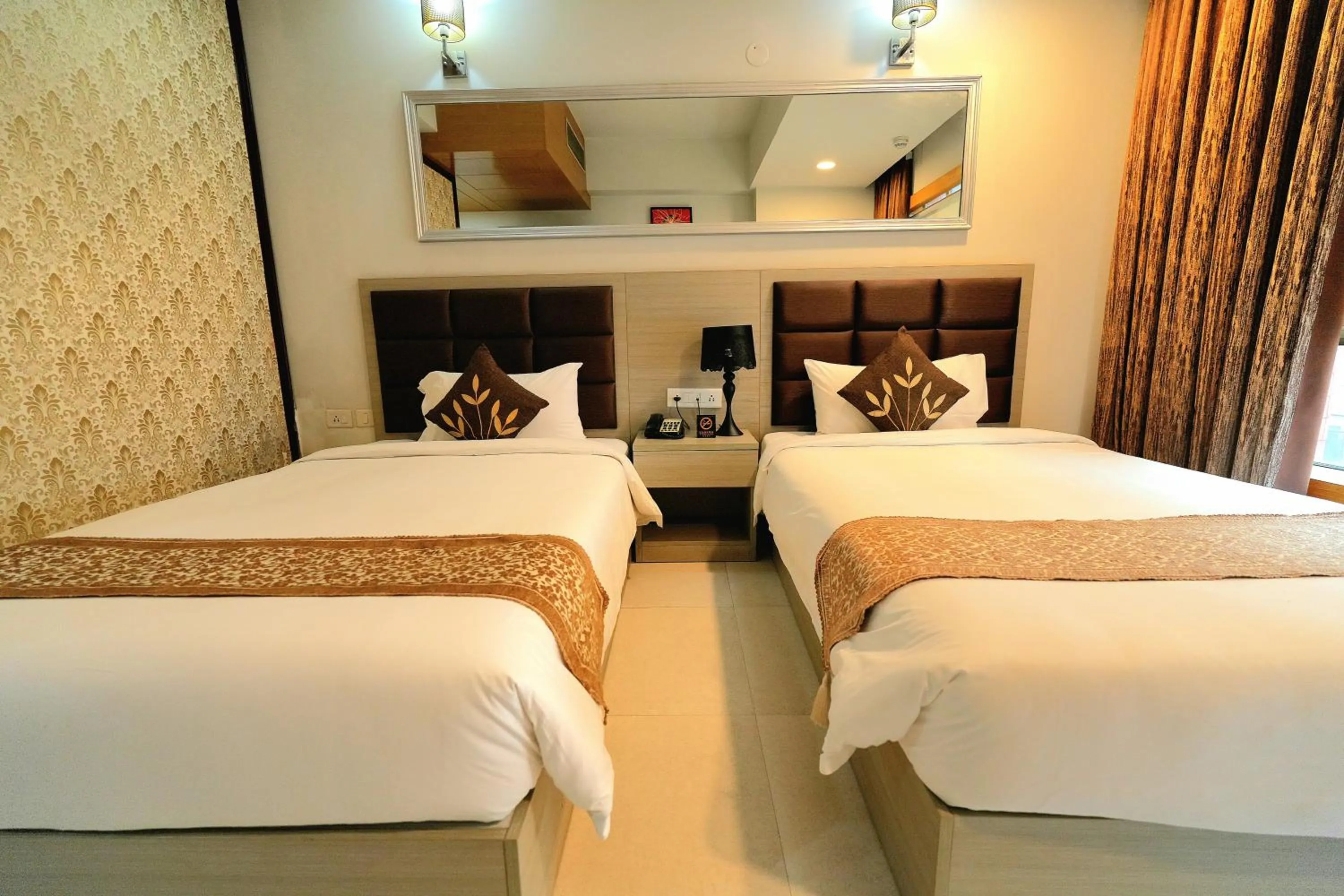 Bed in Aristocrat Hotel, New Town, Kolkata