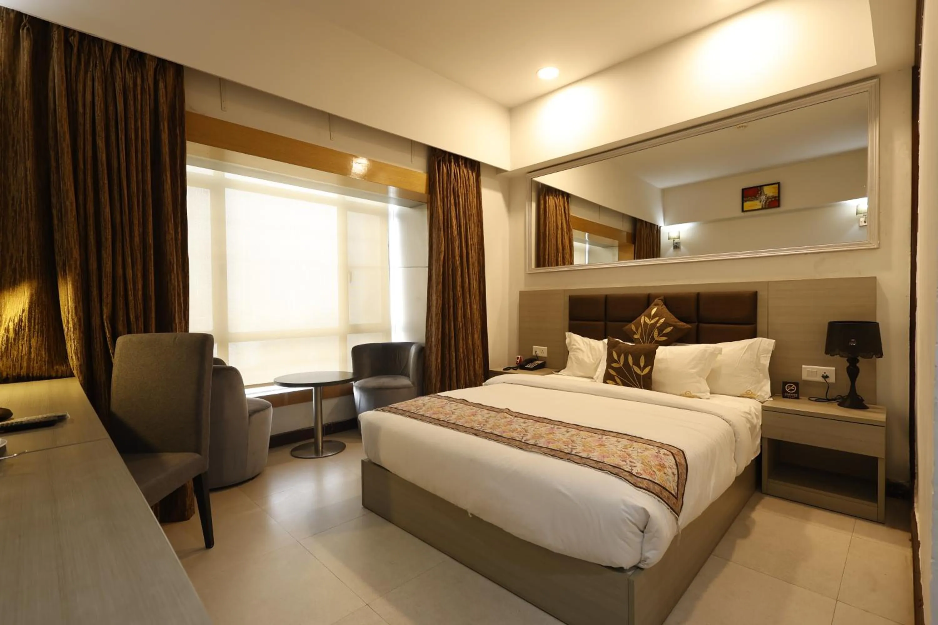 Bed in Aristocrat Hotel, New Town, Kolkata