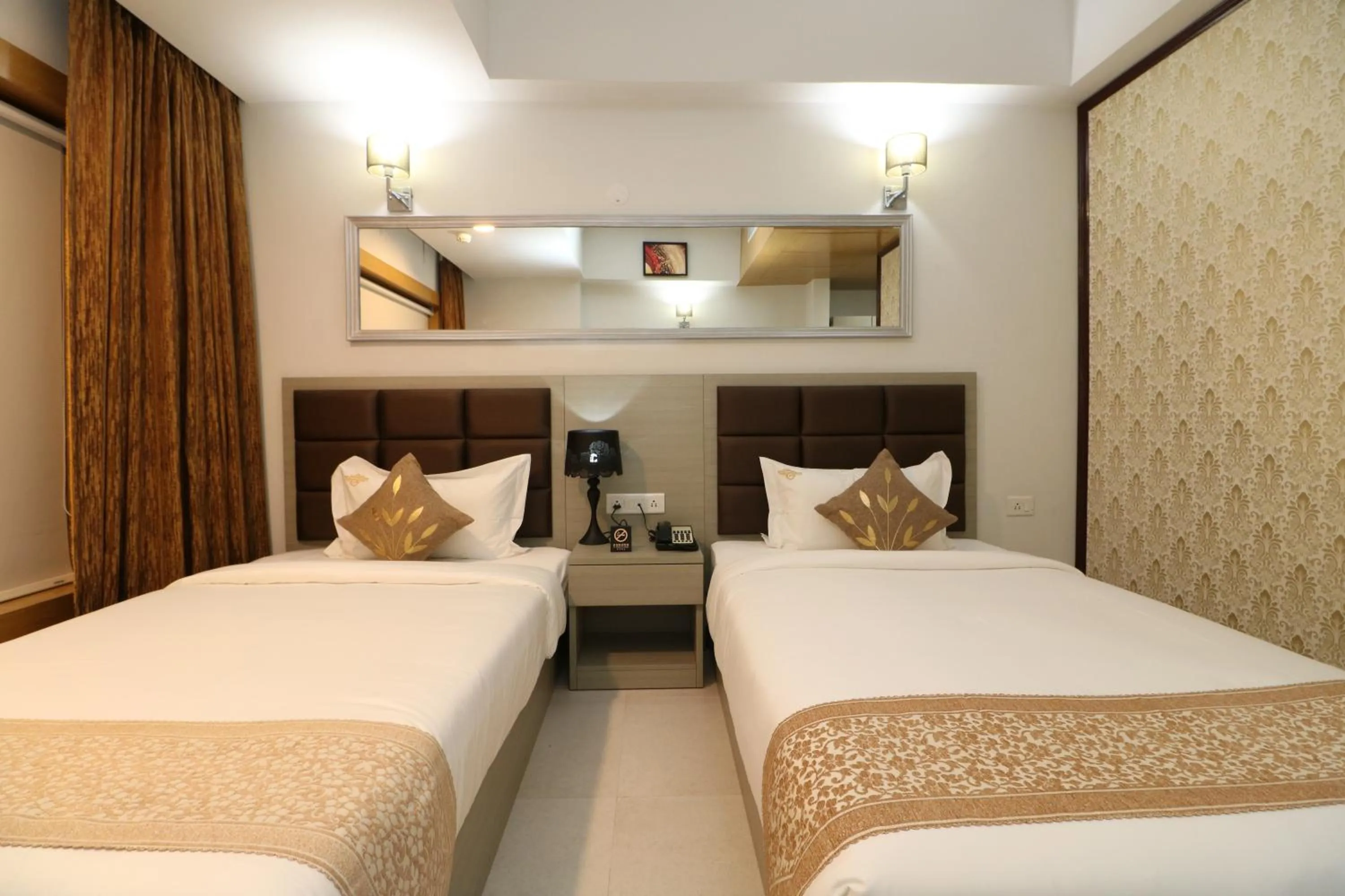 Bed in Aristocrat Hotel, New Town, Kolkata