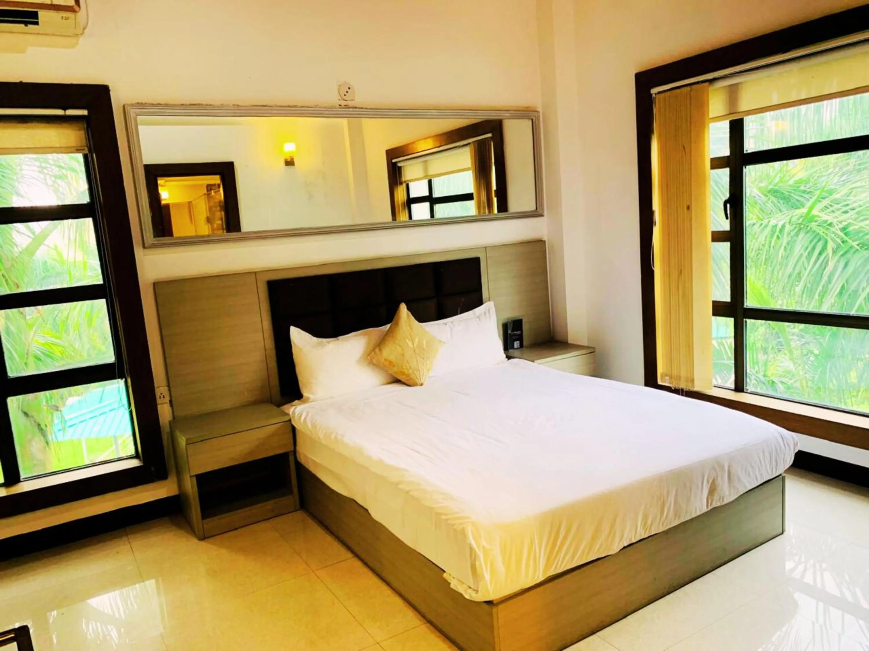 Bed in Aristocrat Hotel, New Town, Kolkata