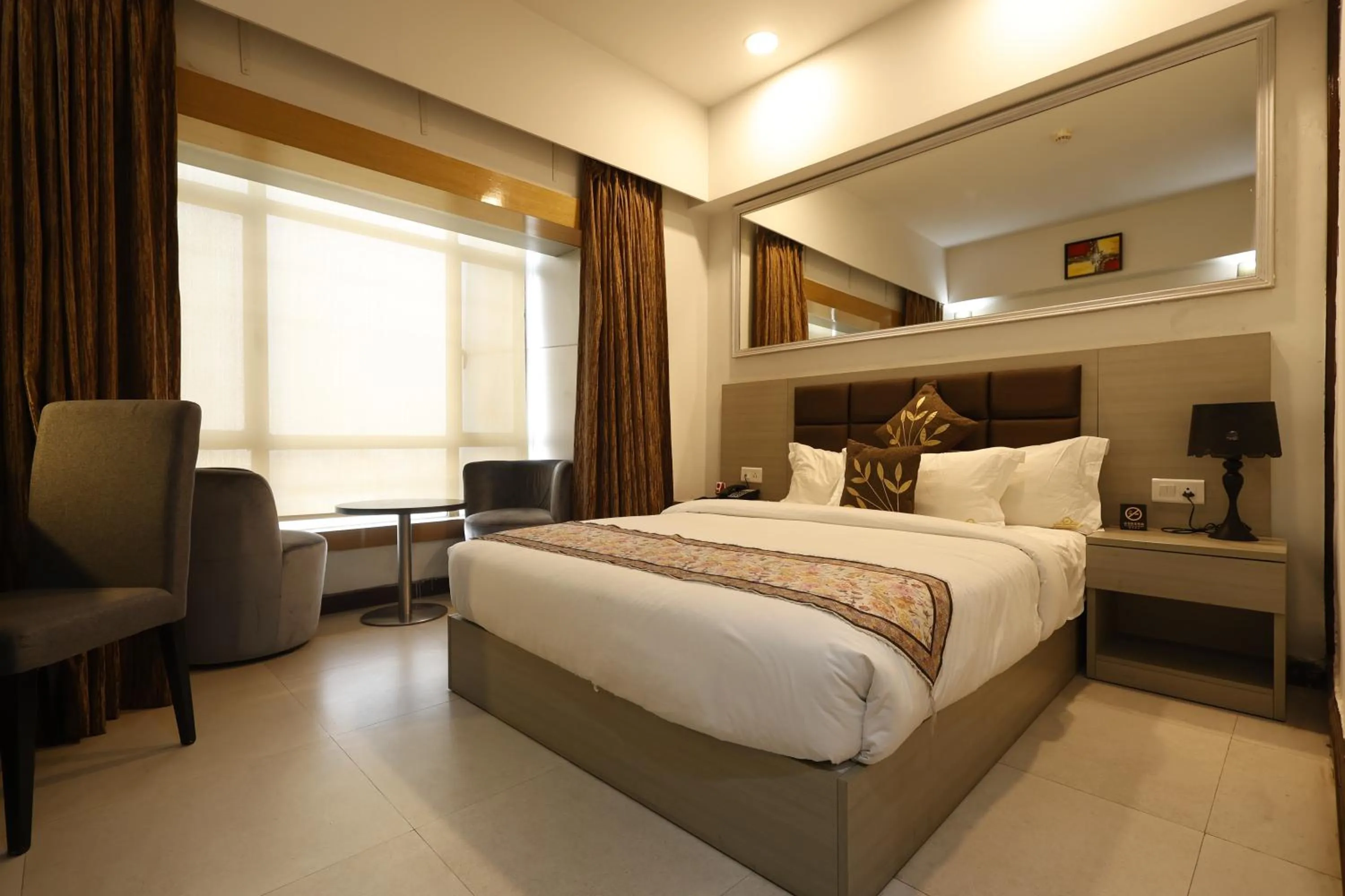 Bed in Aristocrat Hotel, New Town, Kolkata