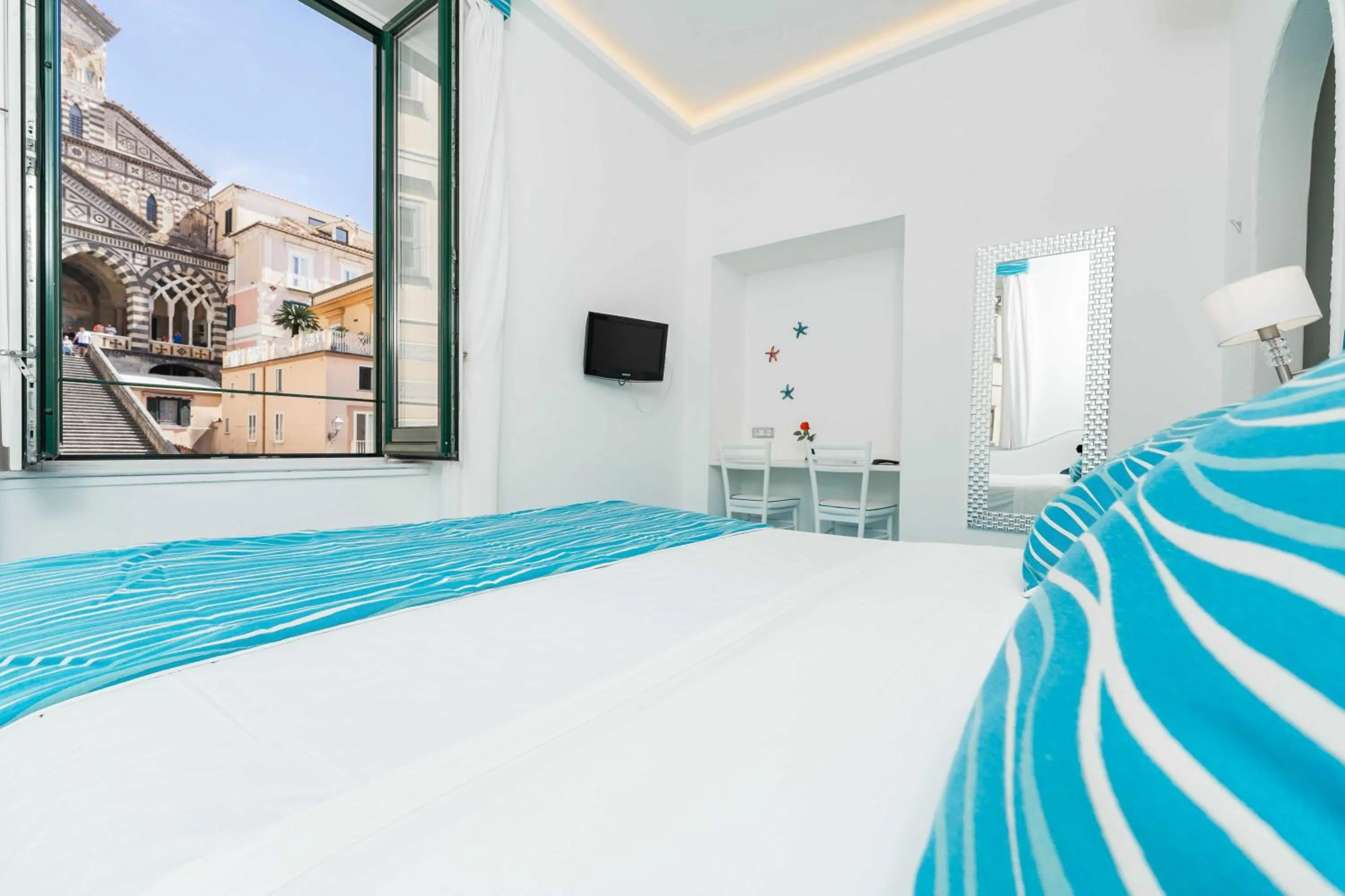 Photo of the whole room, Bed in Albergo S. Andrea