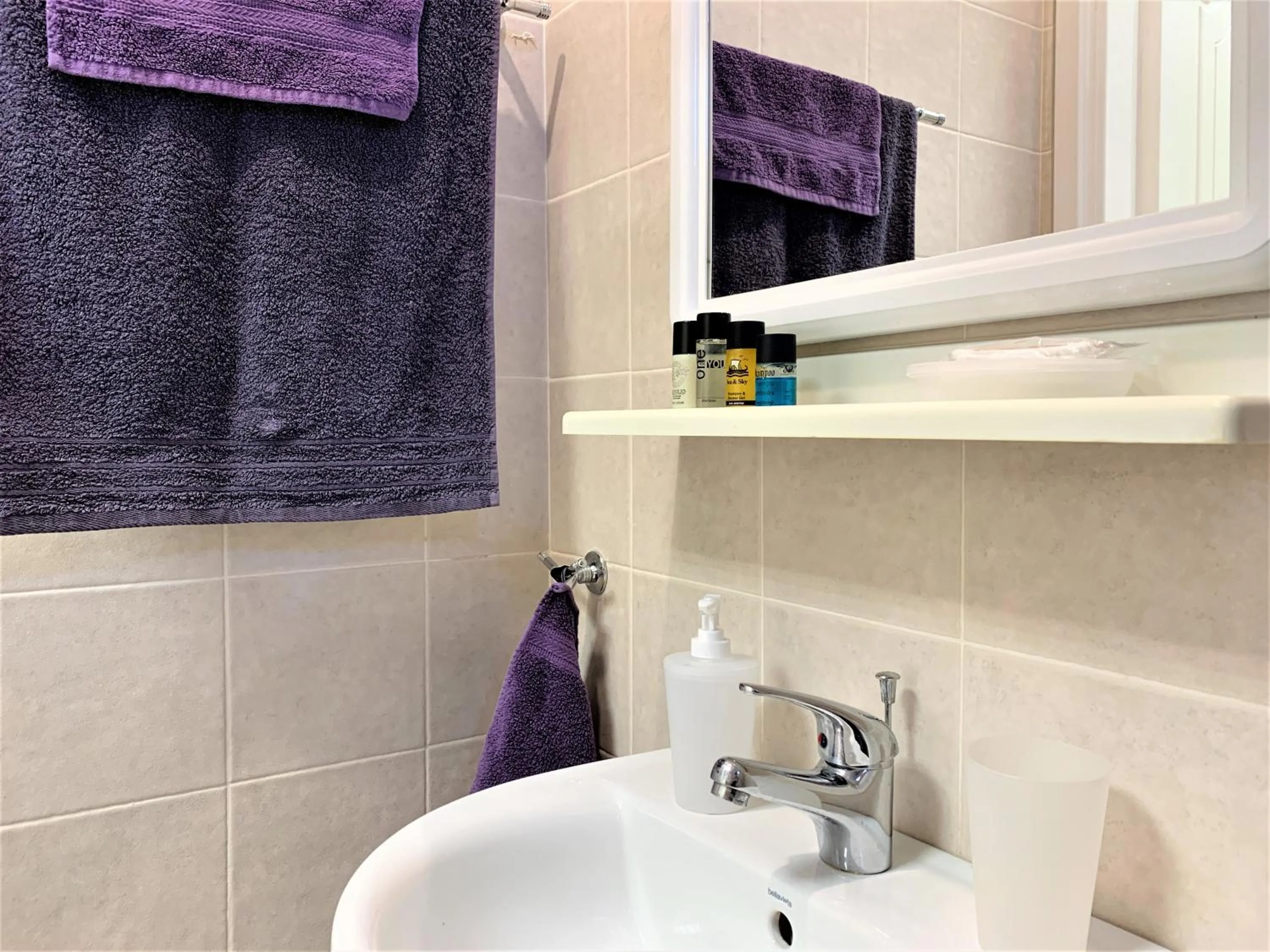 Bathroom in GK Airport Suites - Free Shuttle by GK Properties