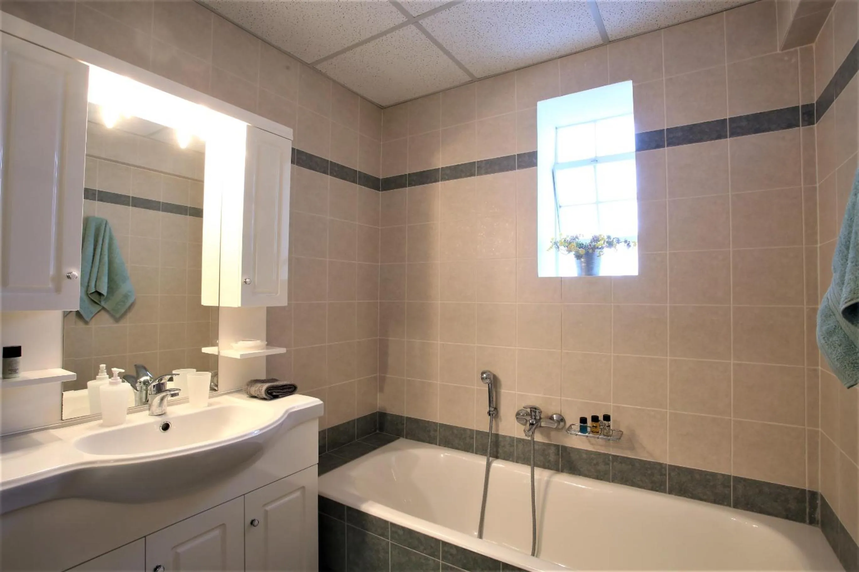 Bathroom in GK Airport Suites - Free Shuttle by GK Properties