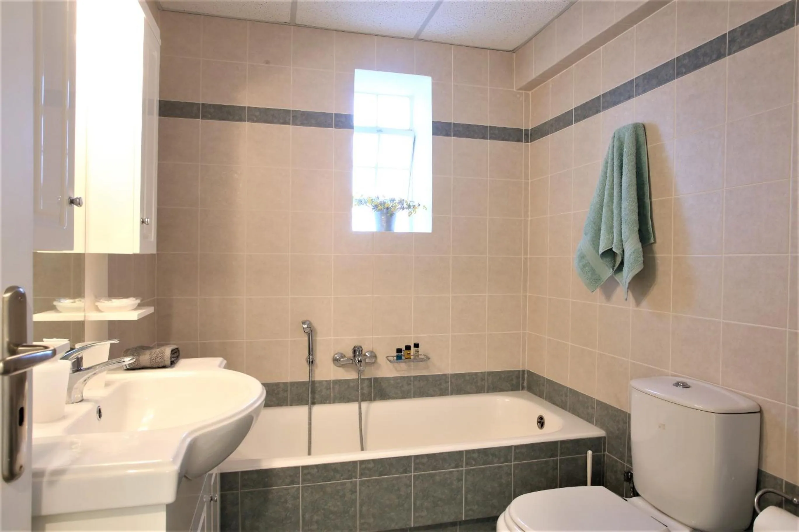 Bathroom in GK Airport Suites - Free Shuttle by GK Properties