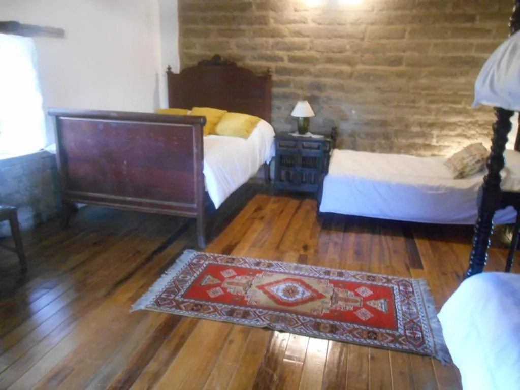 Photo of the whole room, Bed in Estancia El Sol
