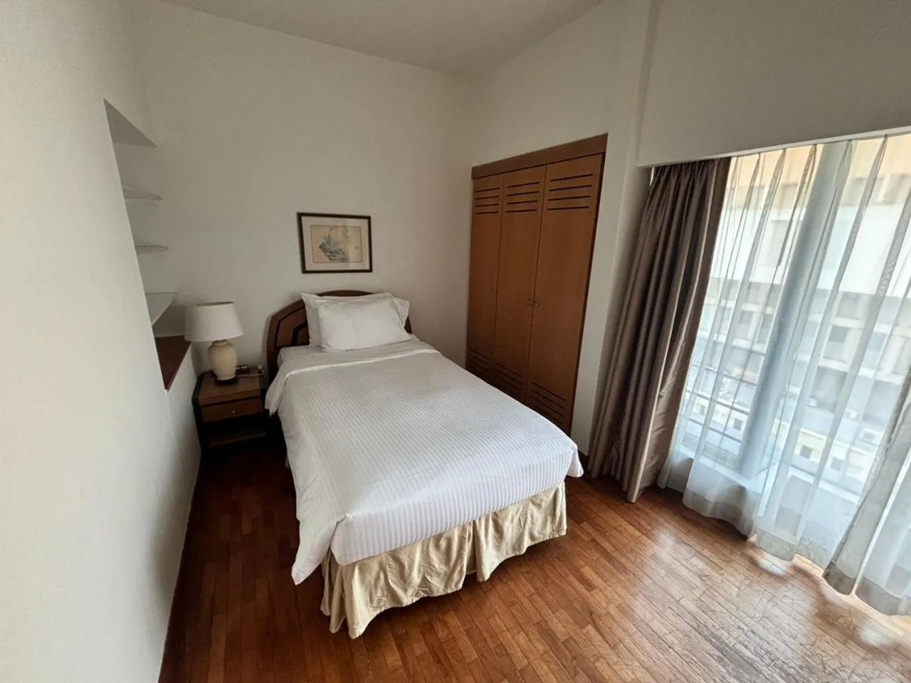 Bedroom, Bed in Orchard Point Serviced Apartments