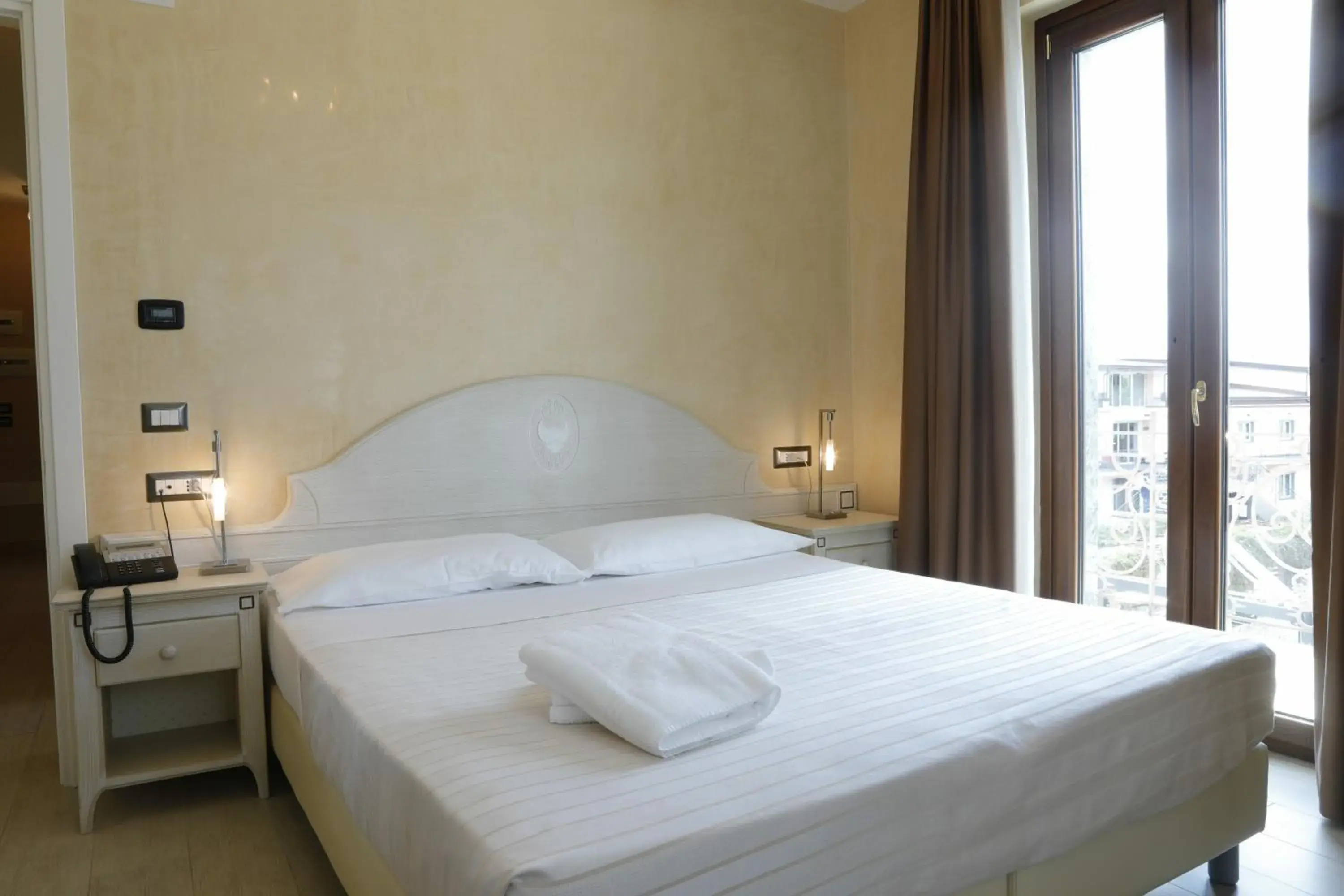 Bed in L' Araba Fenice Hotel & Resort Bed in L' Araba Fenice Hotel & Resort